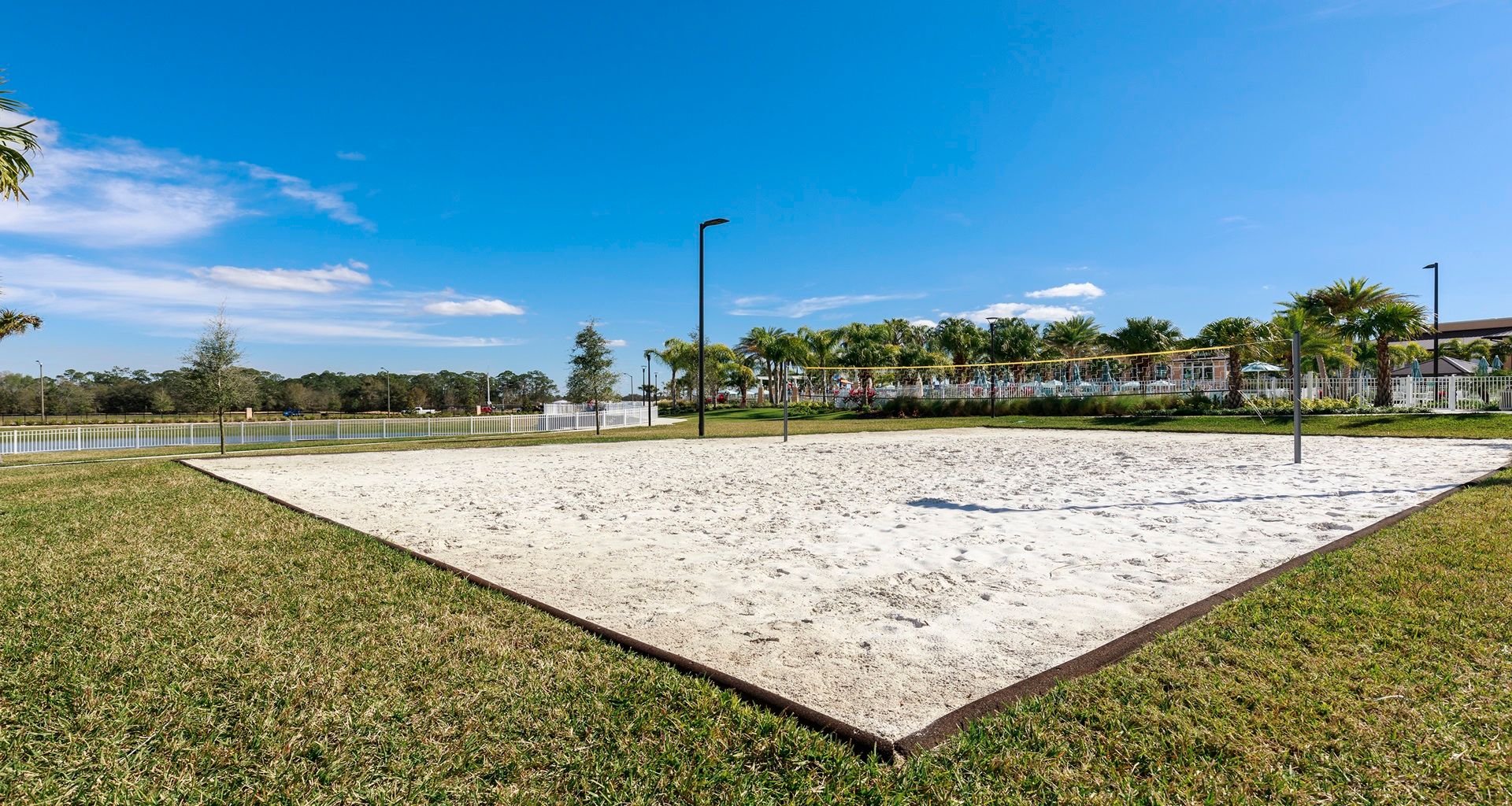 Enjoy a sunny day on the sand volleyball court with friends!