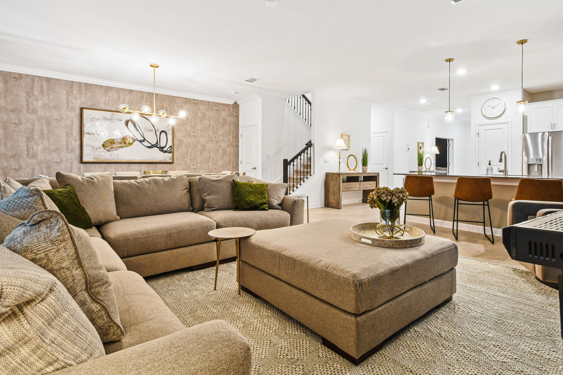 Spacious living room area with cozy sofa, perfect for family reunion