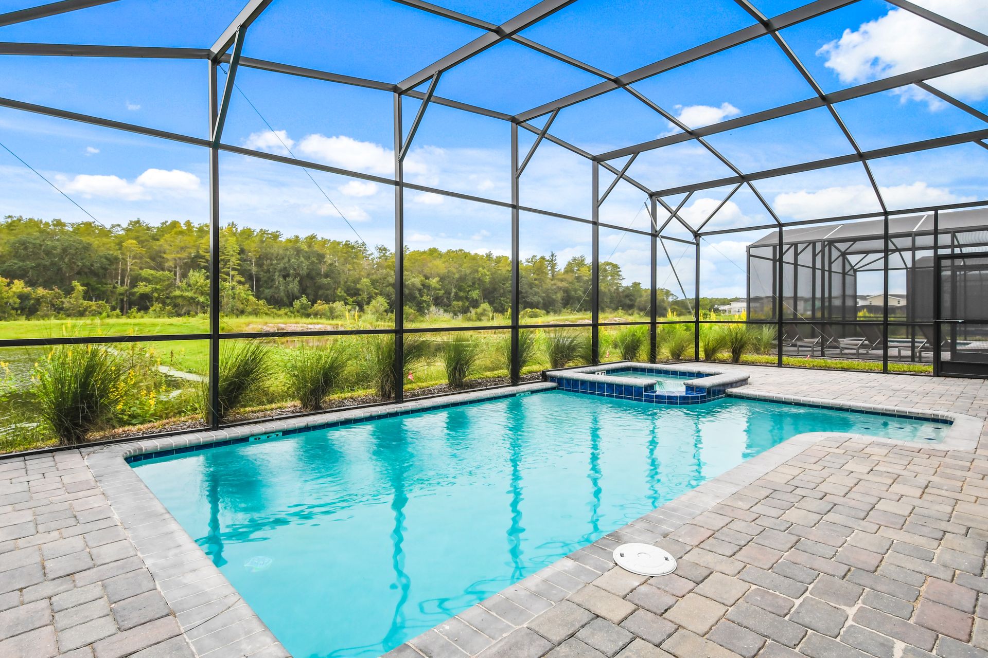 Luxuriate in the spa with views out onto the lake