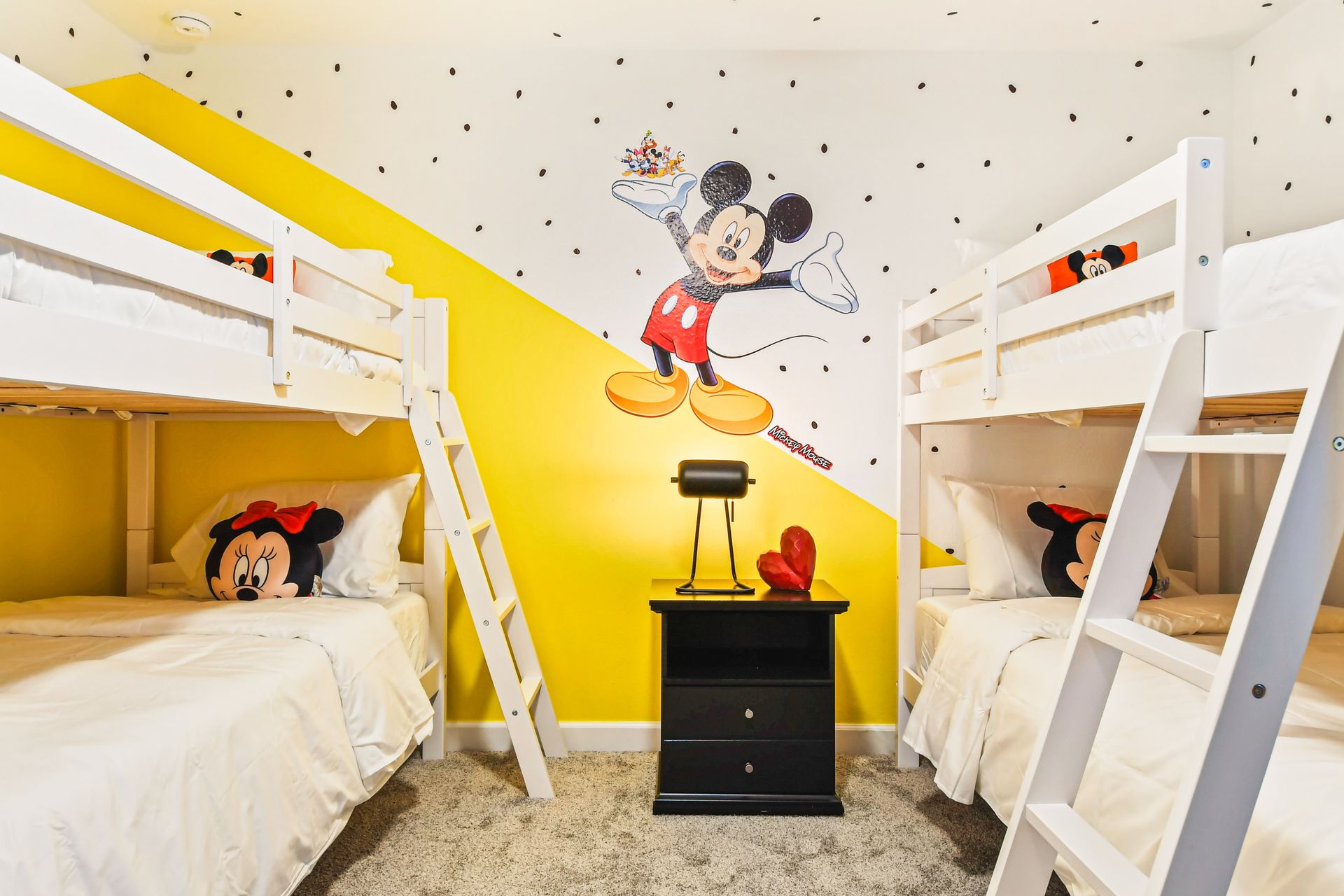 Cheerful kids’ room with twin bunk beds and playful Mickey & Minnie decor