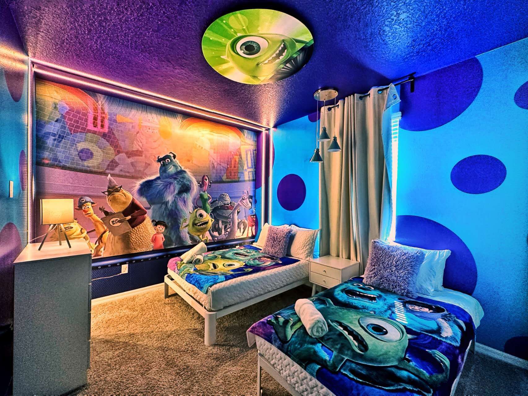 Whimsical themed kids' room with vibrant decor and cozy twin beds.