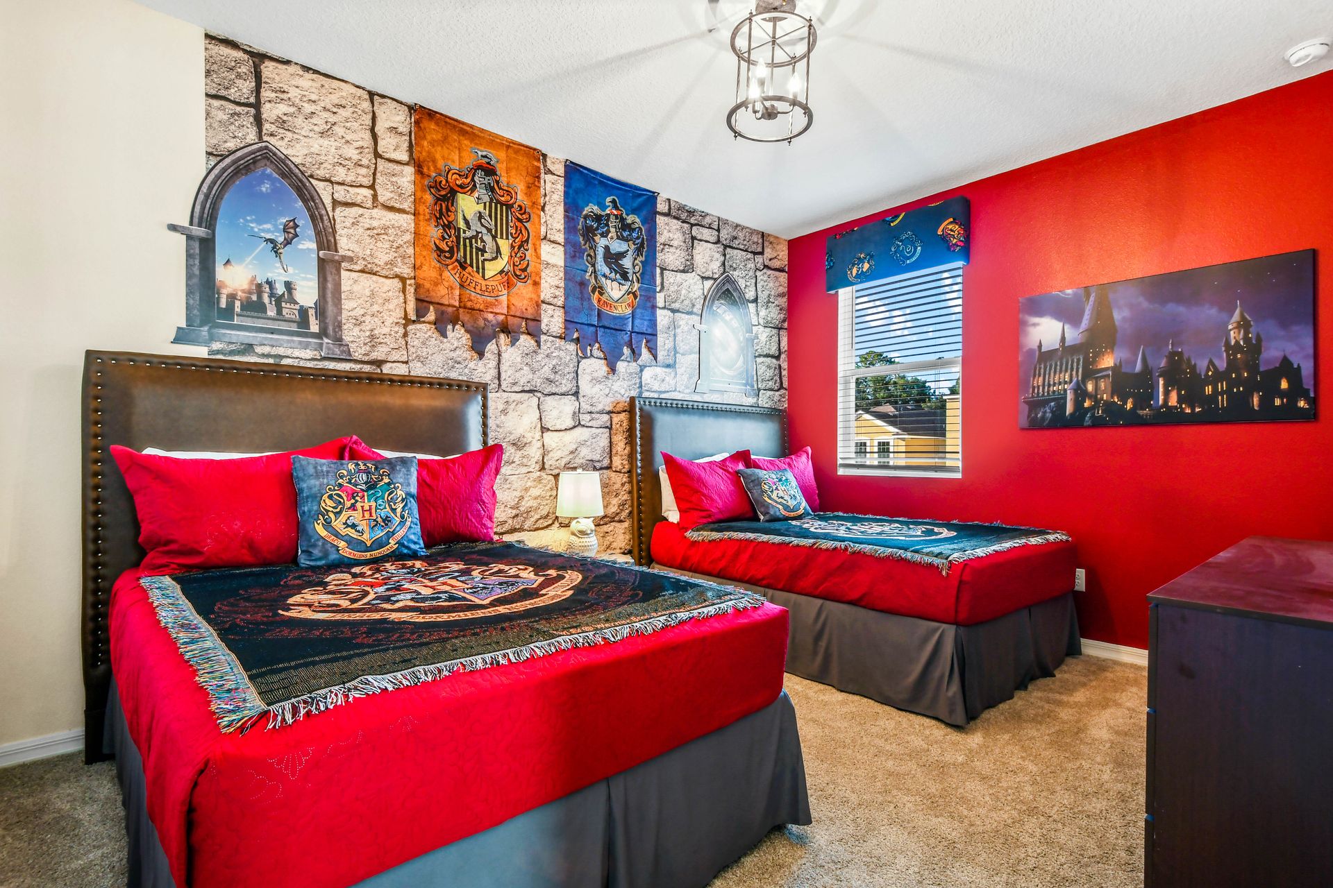 Magical Hogwarts-themed bedroom with cozy beds and house banners!