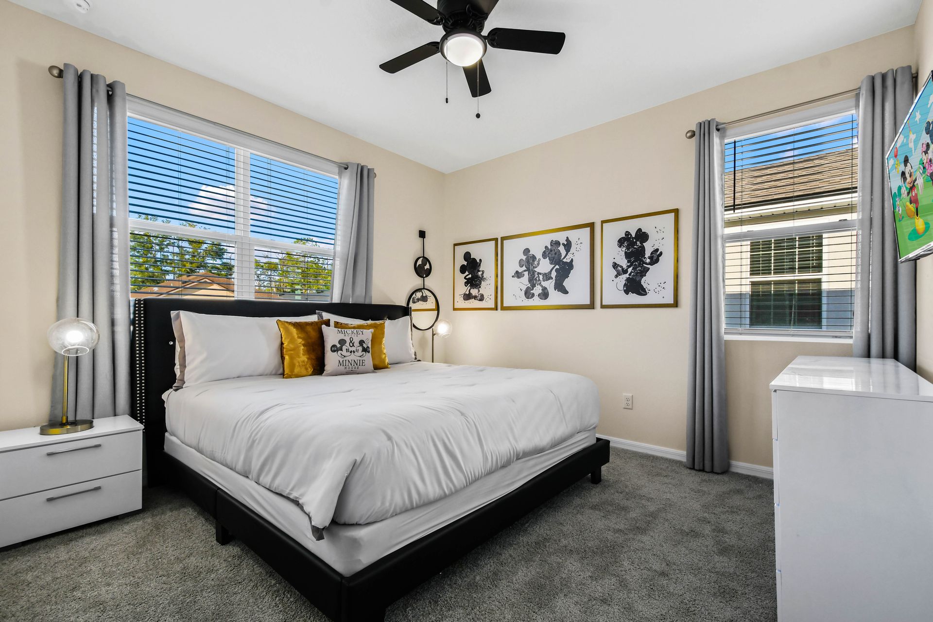 Charming Disney-themed bedroom with cozy decor and natural light!