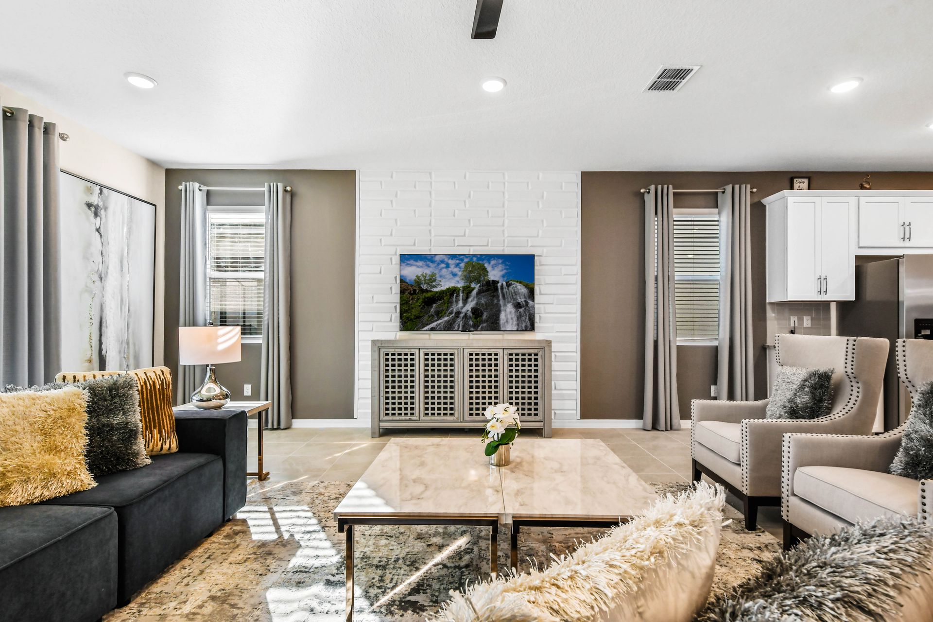 Bright, modern living room with cozy seating and stylish decor