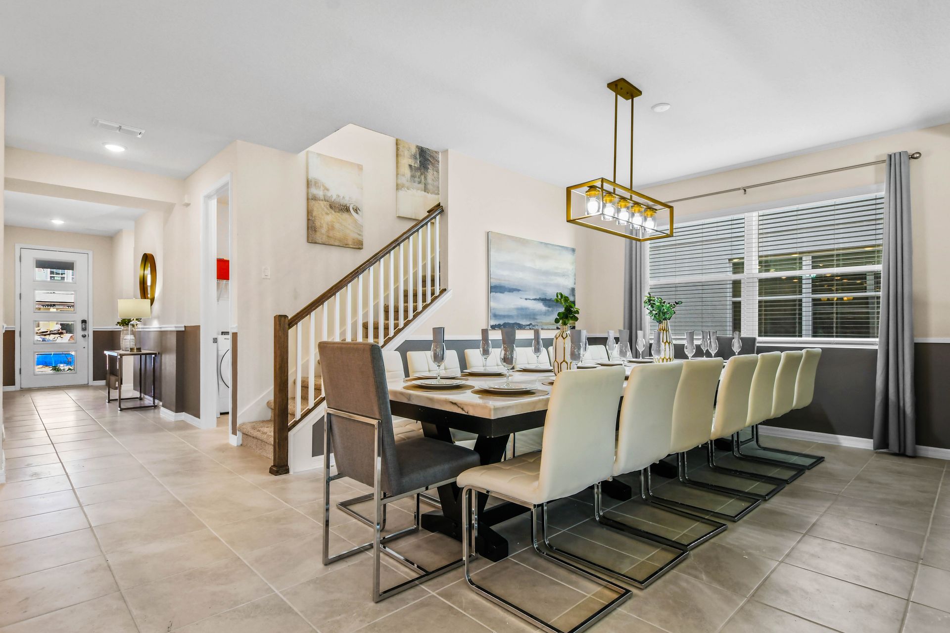 Stylish dining room for 12, elegant decor, and natural light!