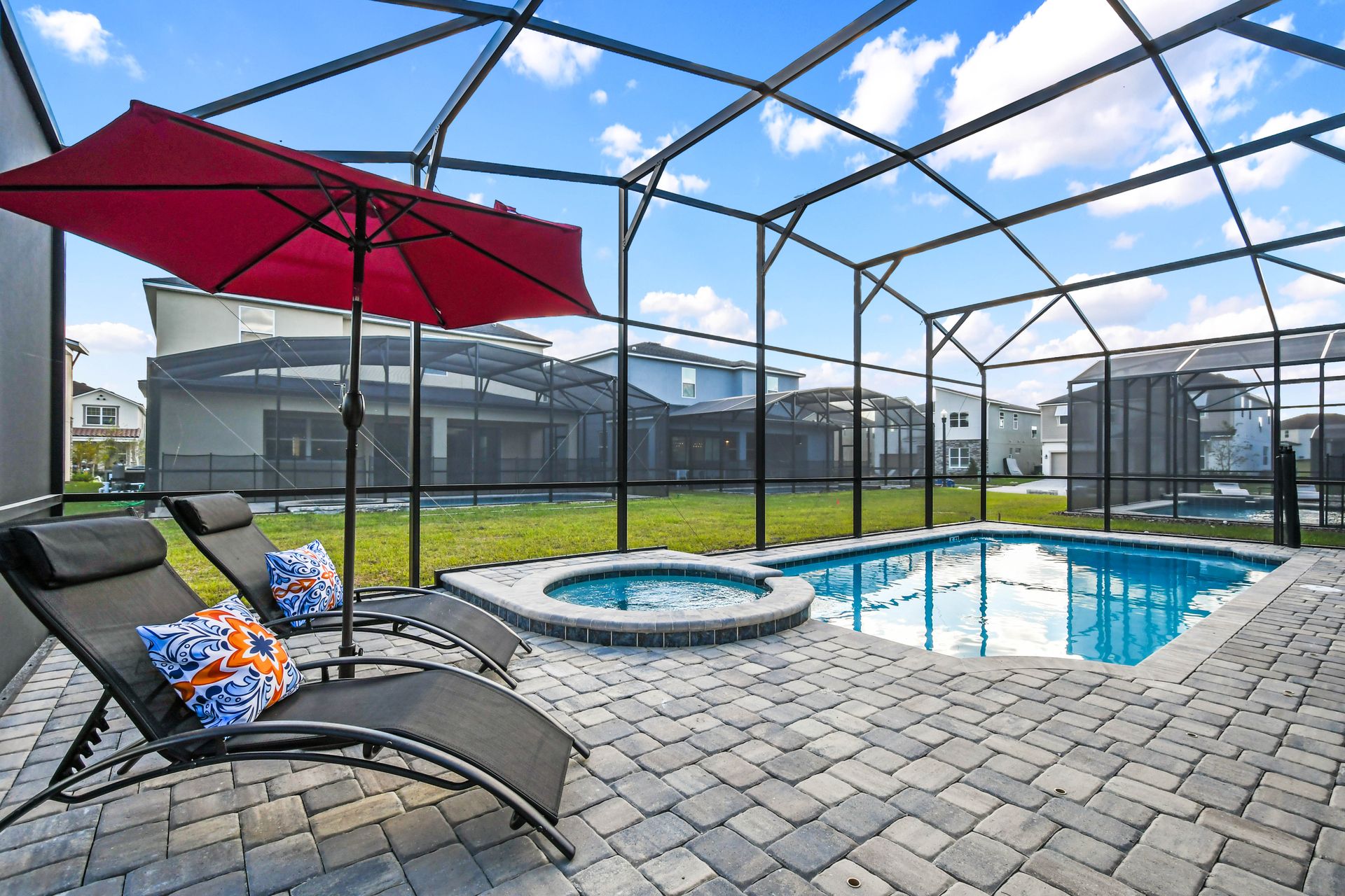 Private screened pool and spa with loungers and sunny relaxation!