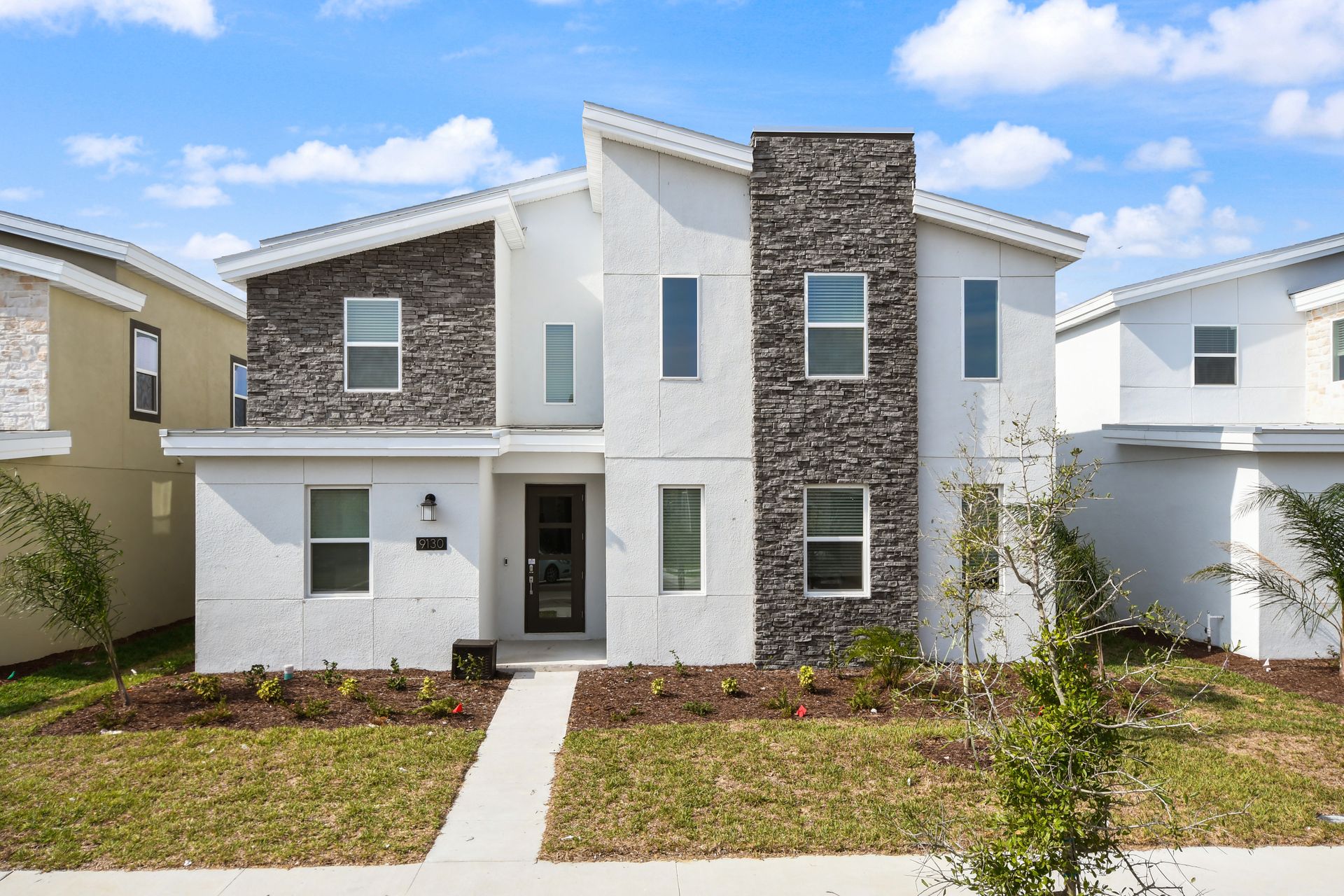Modern 9-bedroom retreat with a pool, game rooms, and themed kid-friendly decor.