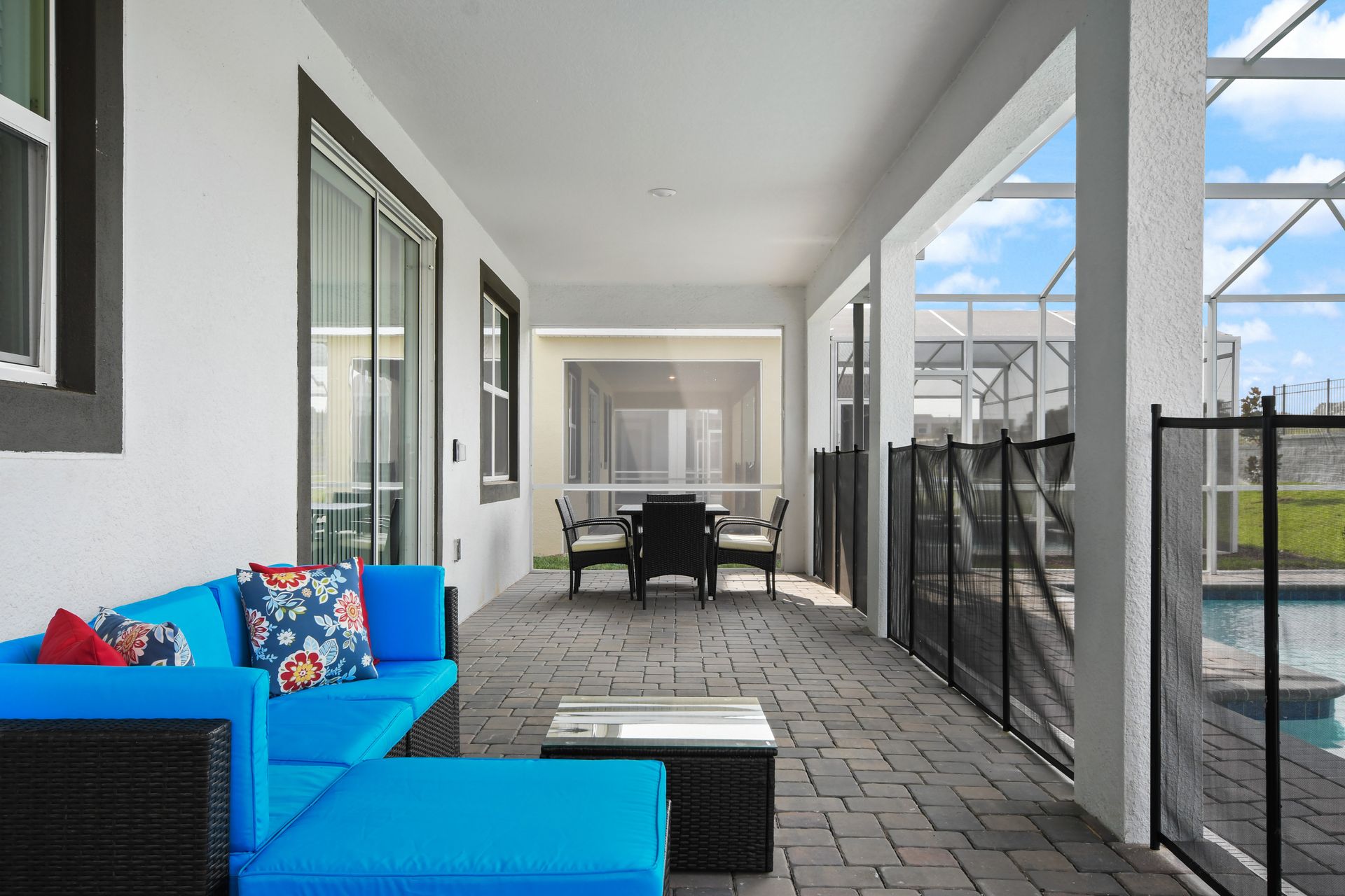 Relax by the pool in style with shaded seating, lounge chairs, and a hot tub.