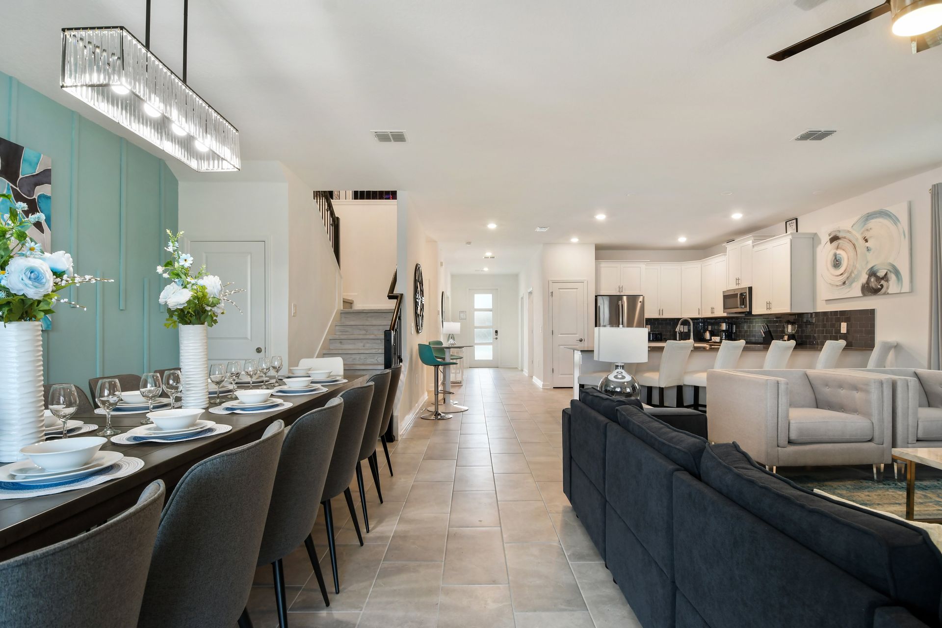 Sleek open-layout home with gourmet kitchen, dining for 12, and chic decor.