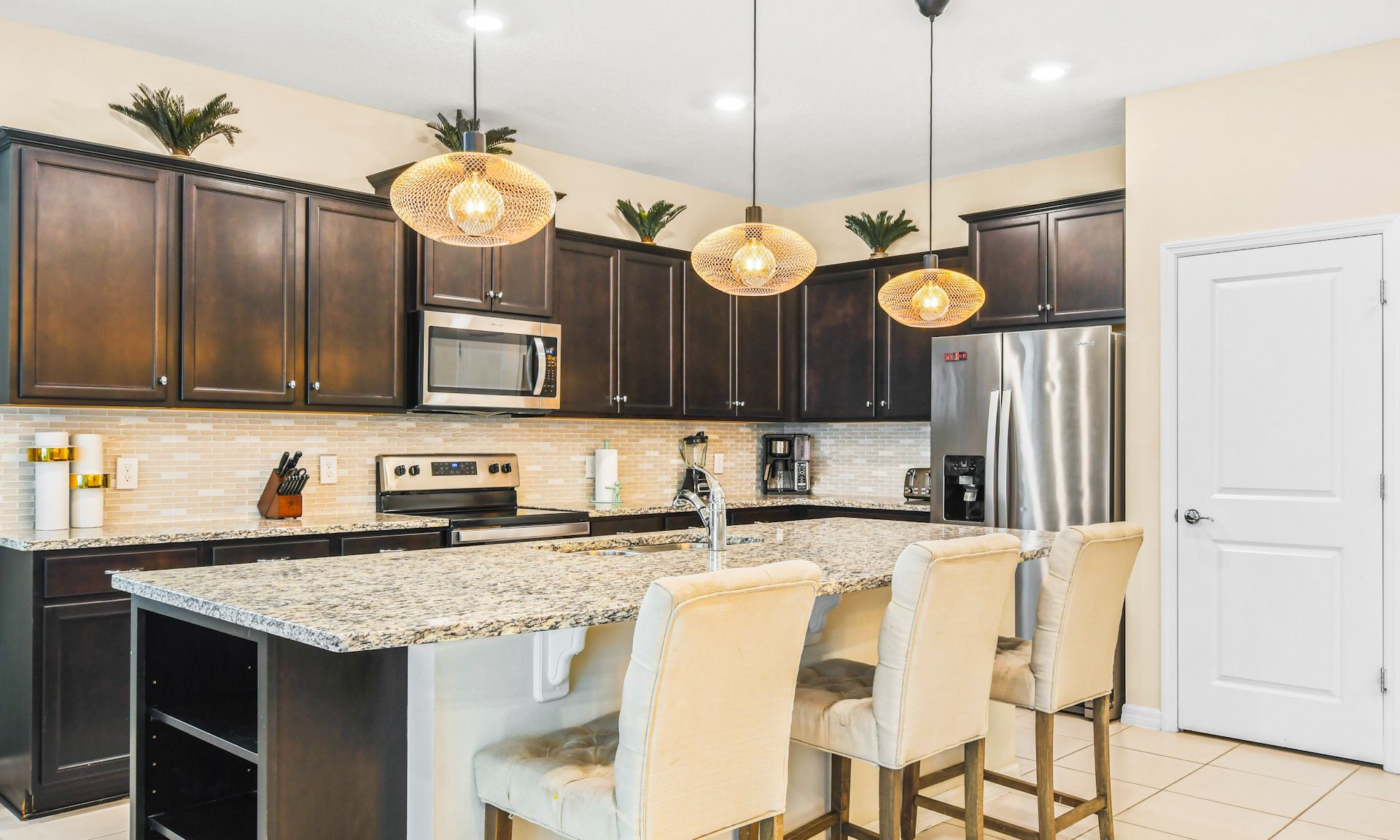 Kitchen island goals! Spacious countertop & stools for breakfast with friends.
