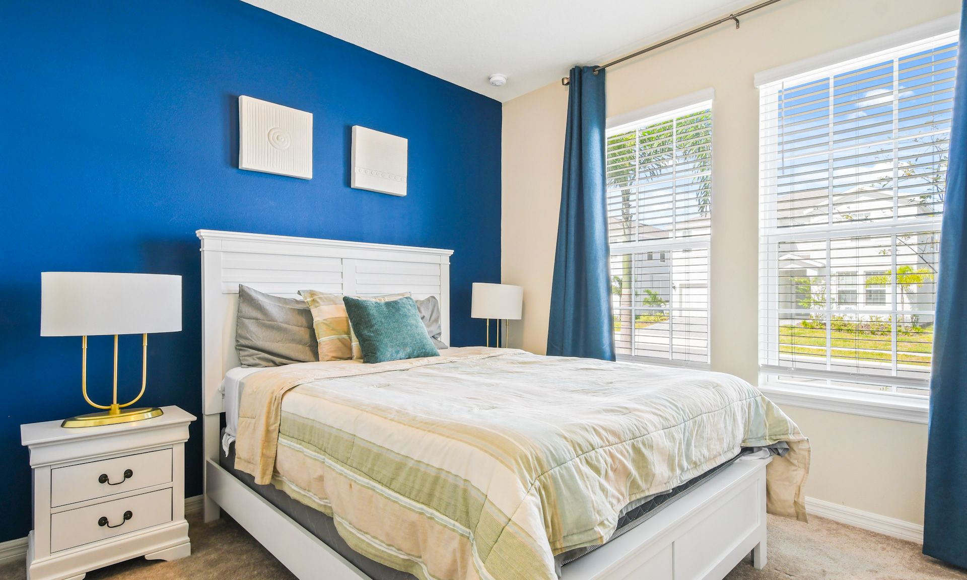Relaxing bedroom bathed in warm morning light.