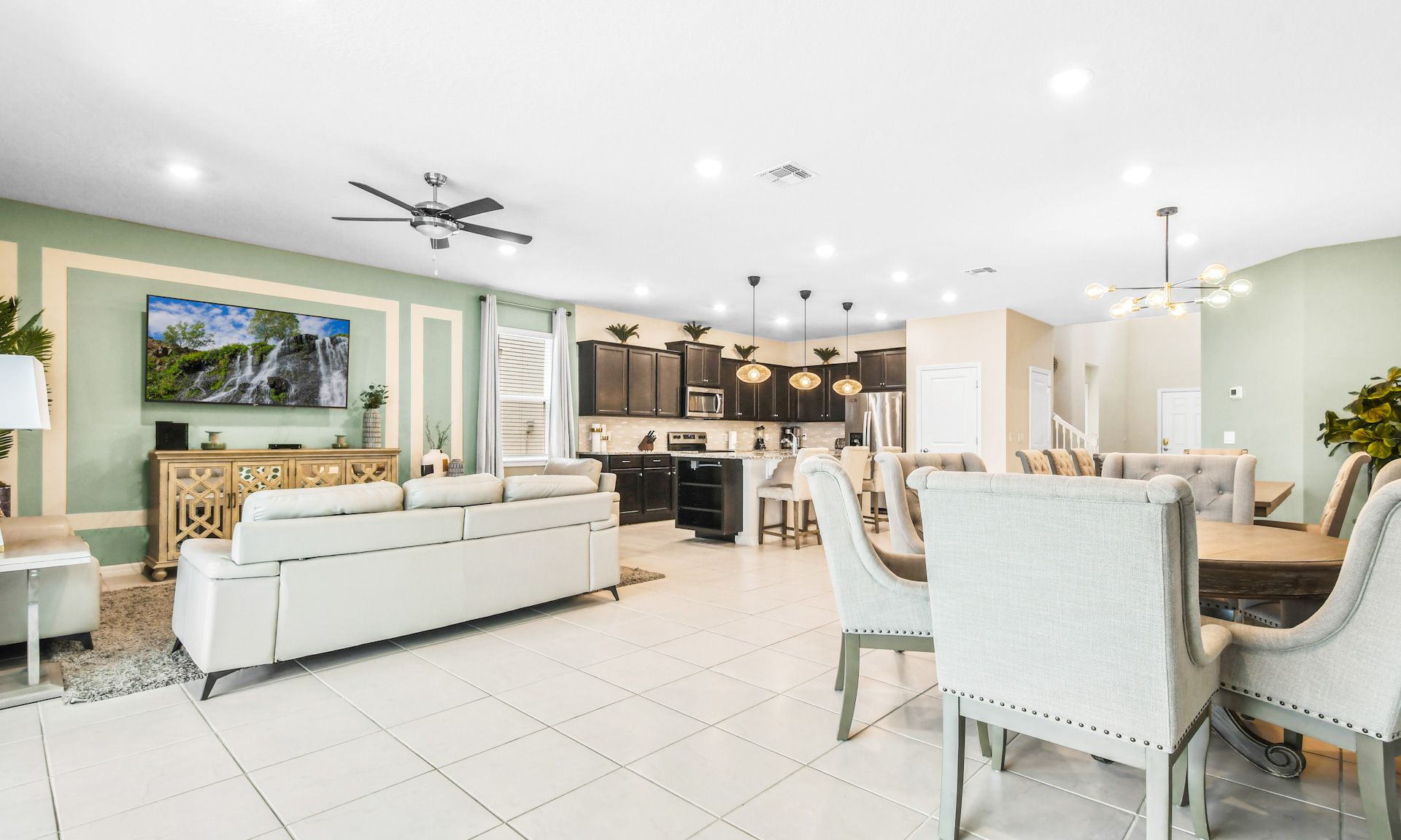 Eat, play, relax! Comfy living meets stylish dining in this open space.