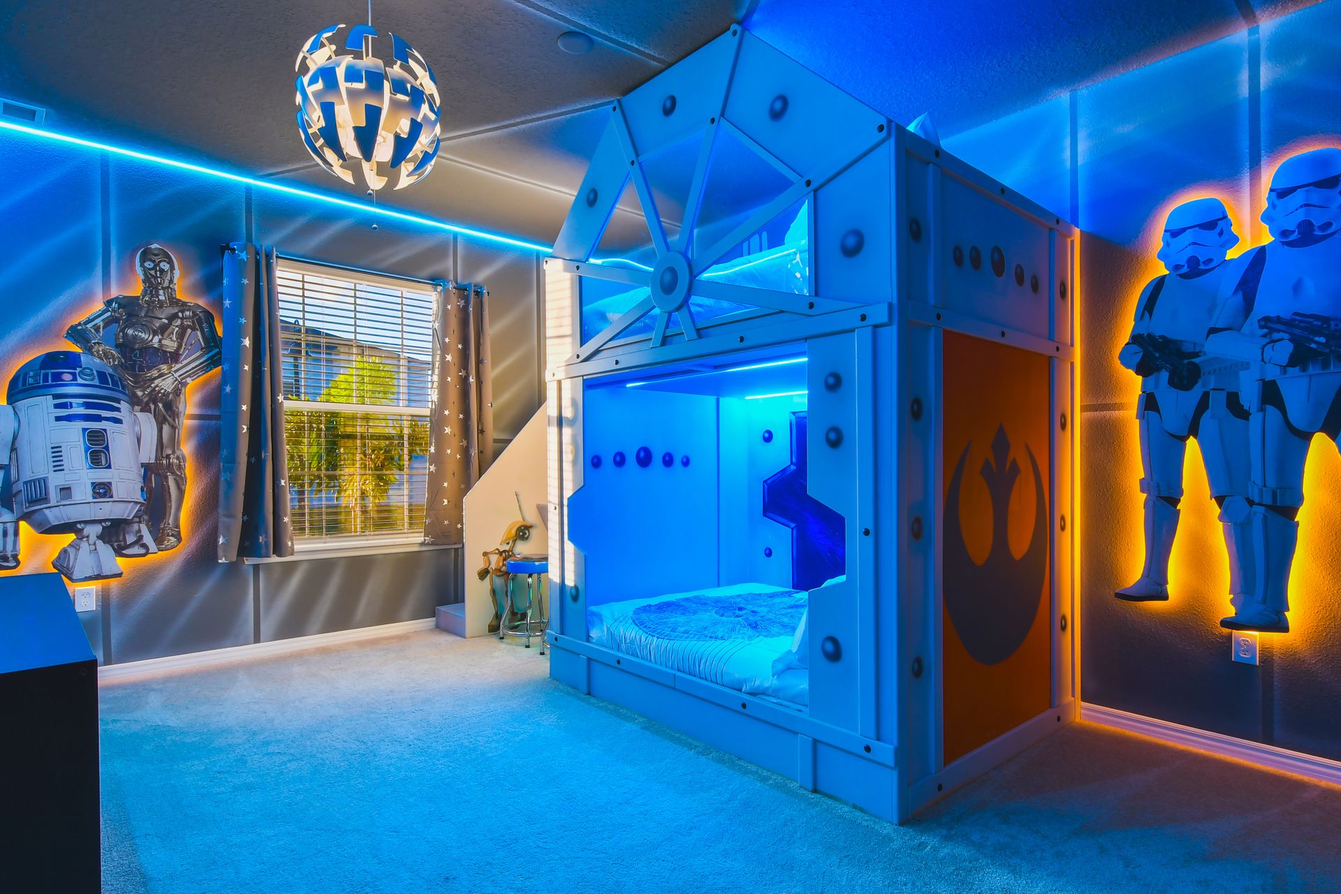 Kids will love the bedroom with a cool Star Wars theme