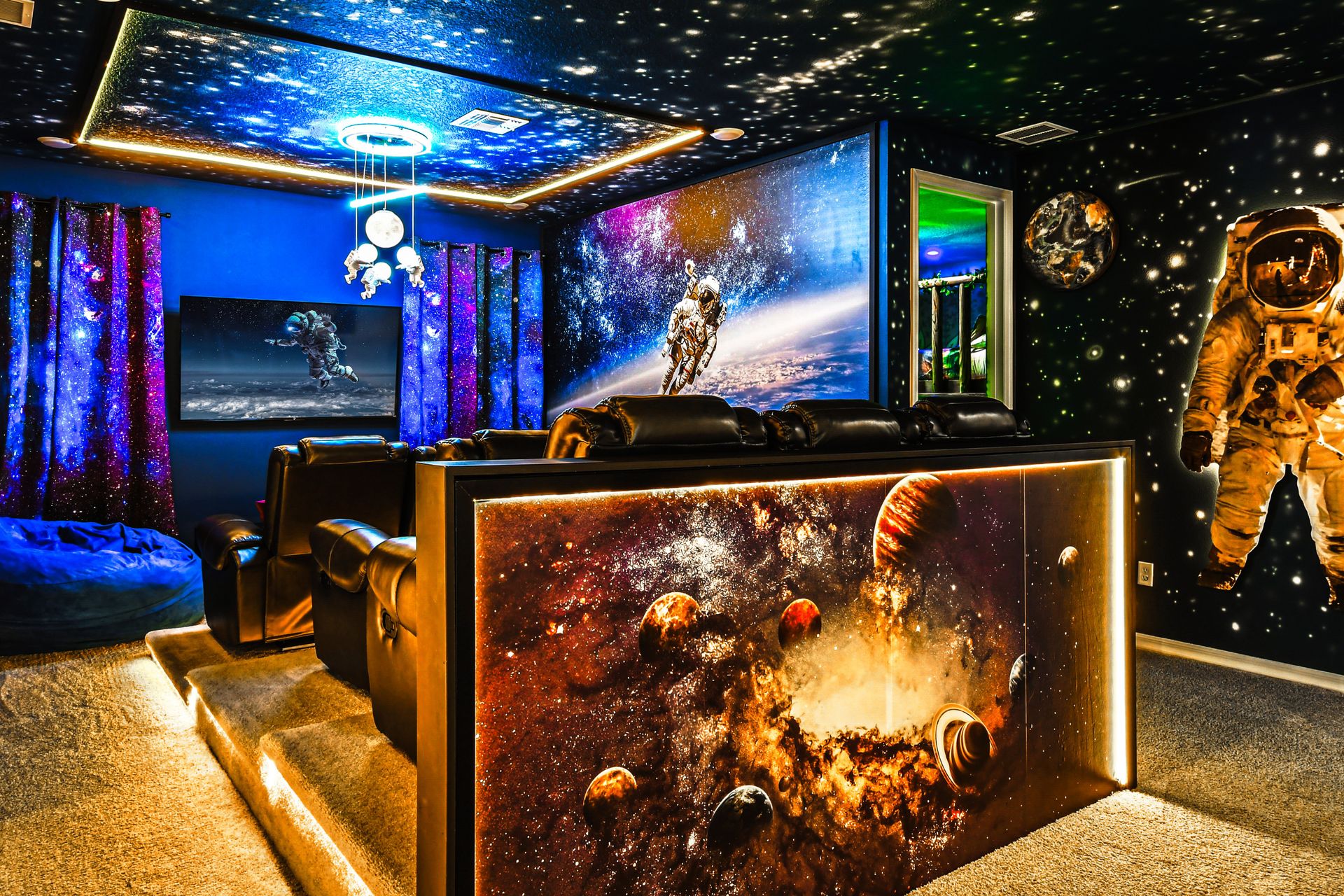 Immersive space-themed home theater with glowing cosmic décor!