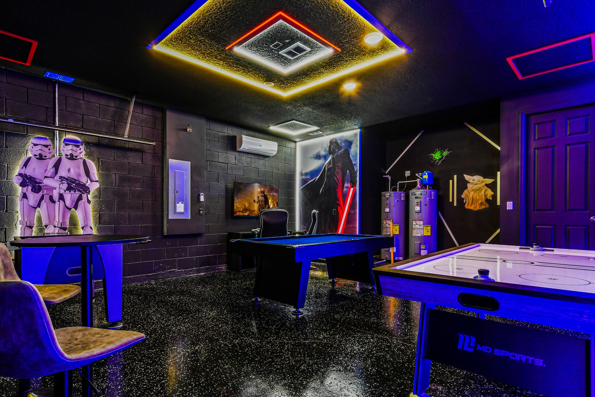 Star Wars-themed game room with neon lights, pool, and air hockey!