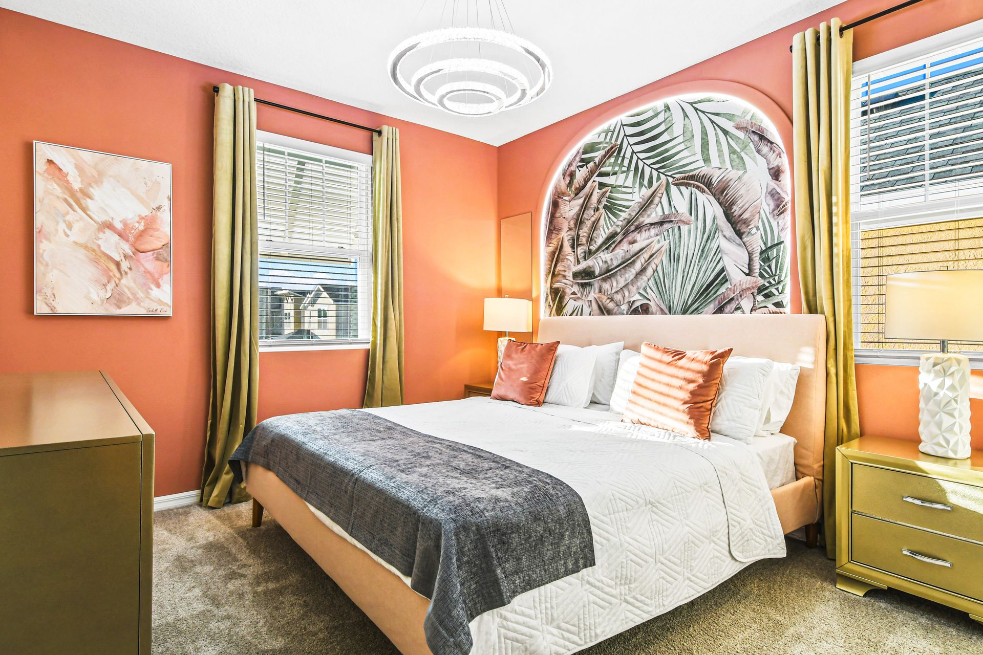 Warm and stylish bedroom with tropical accents and cozy design!