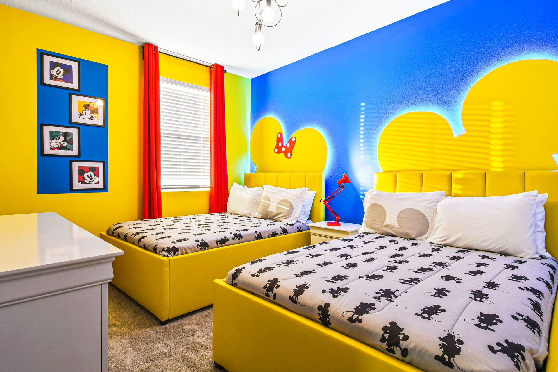 Bright and playful Mickey-themed room with colorful, fun decor!