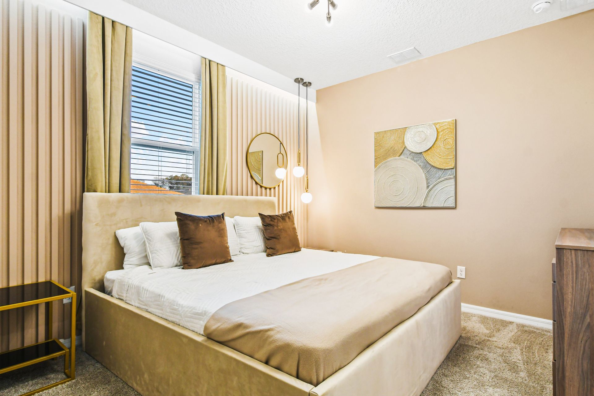 Elegant bedroom with neutral tones, modern decor, and soft lighting!