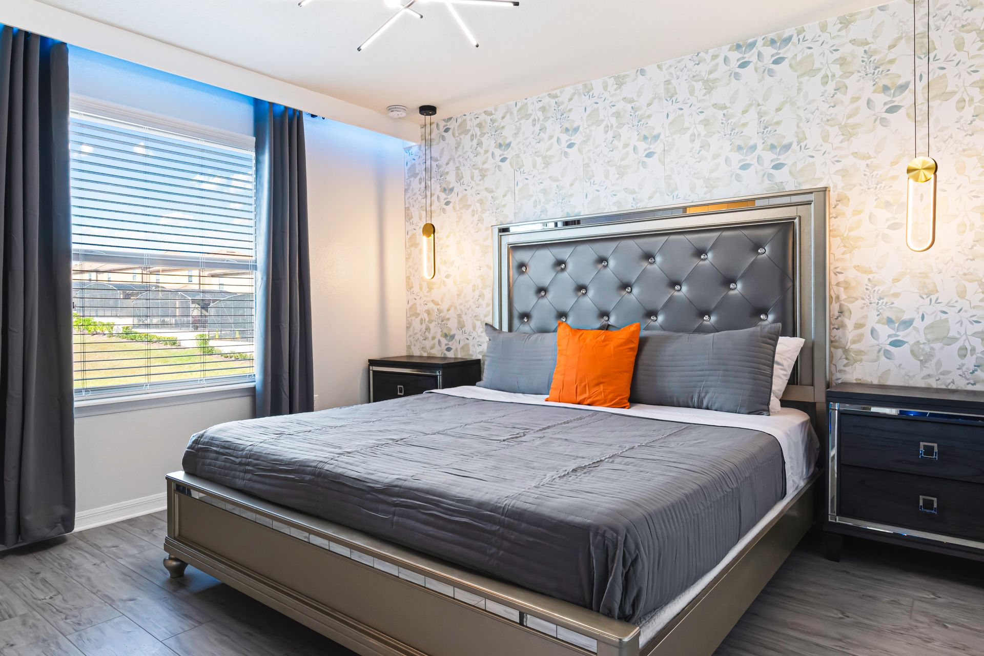 Elegant king suite with stylish décor, natural light, and a modern designer touch.