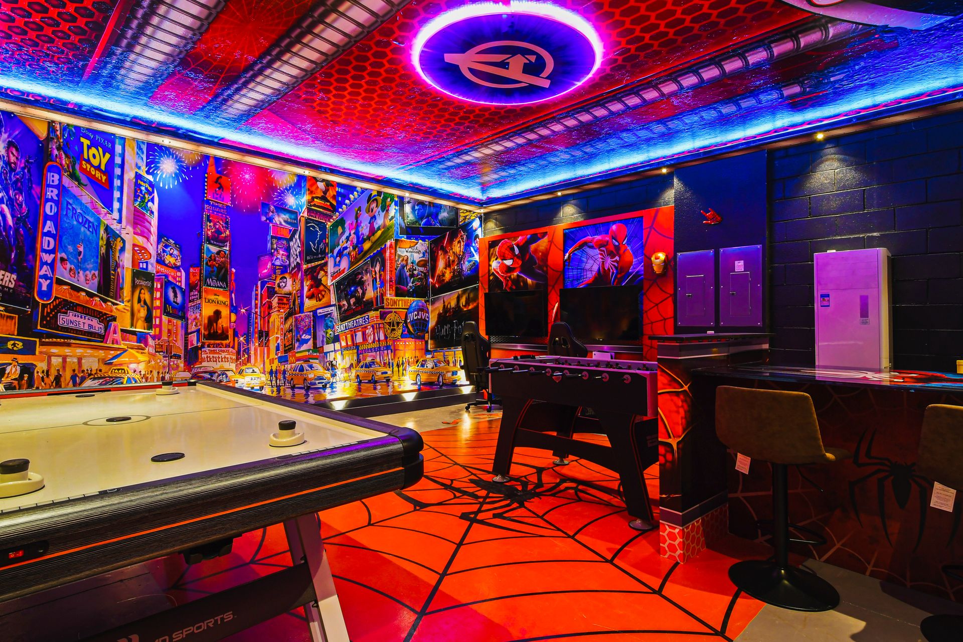 The game room is stylishly furnished with Avengers theme with cool lights.