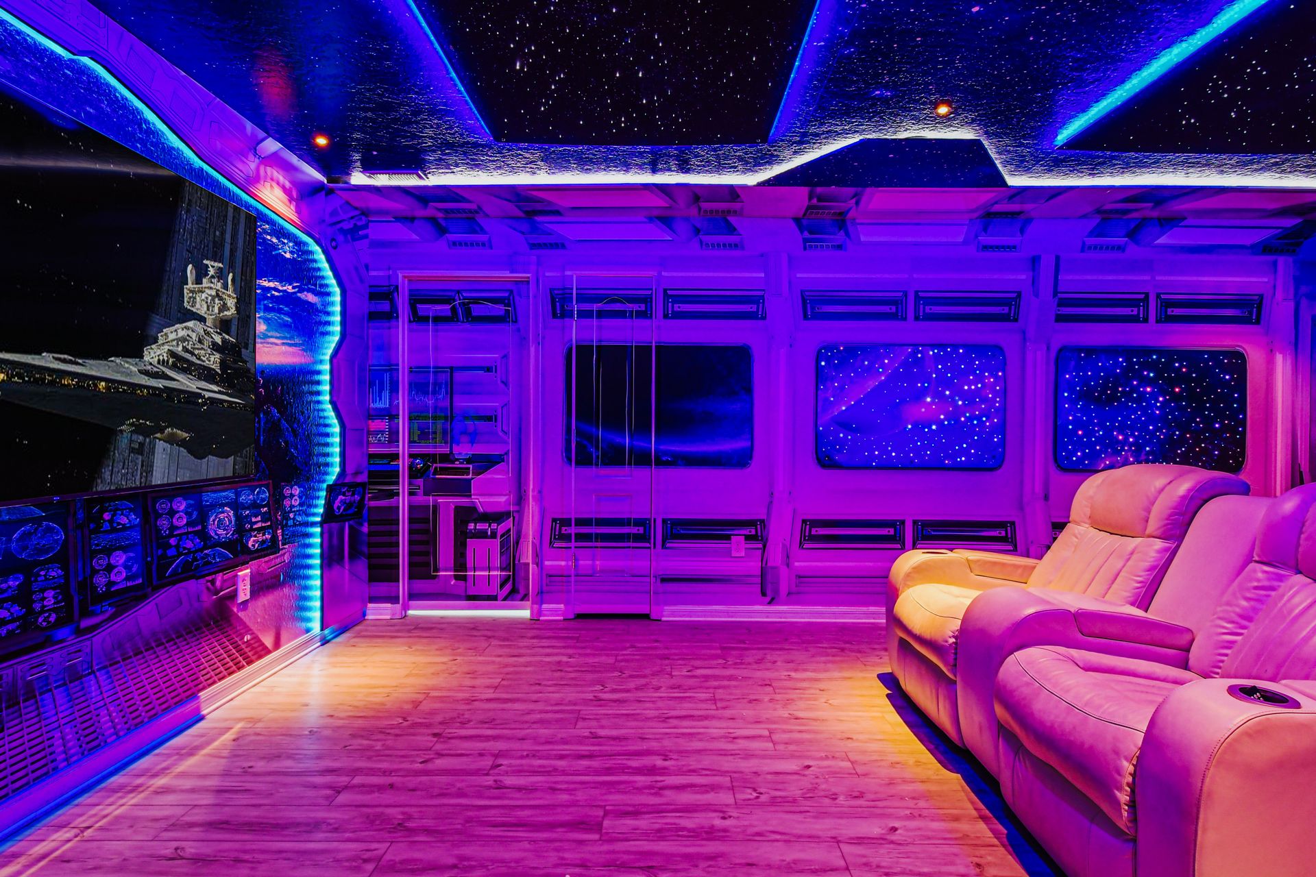 Immersive Star Wars home theater with starlit ceiling and galactic décor.