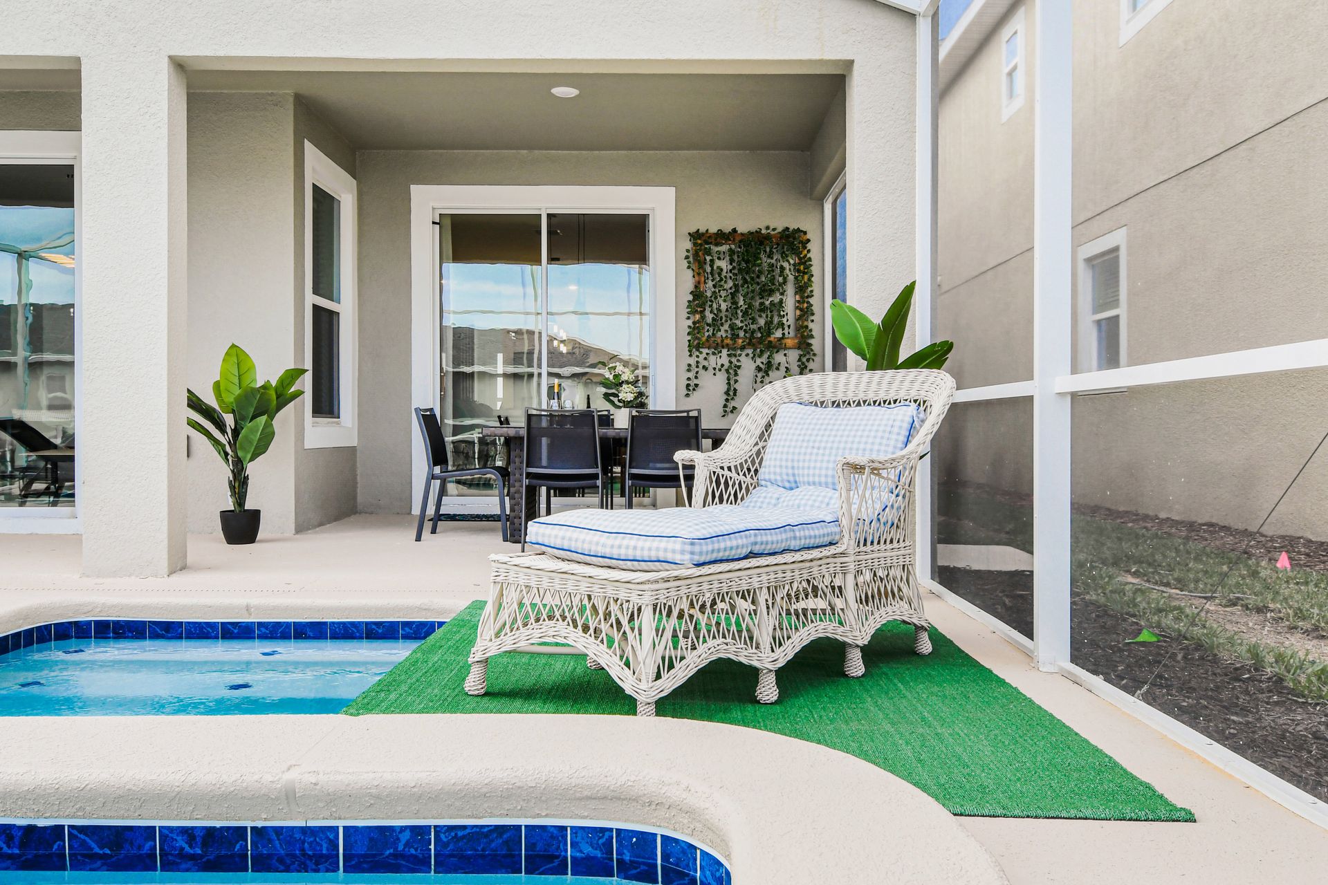 Relax by the private pool with covered dining and cozy screened-in comfort.