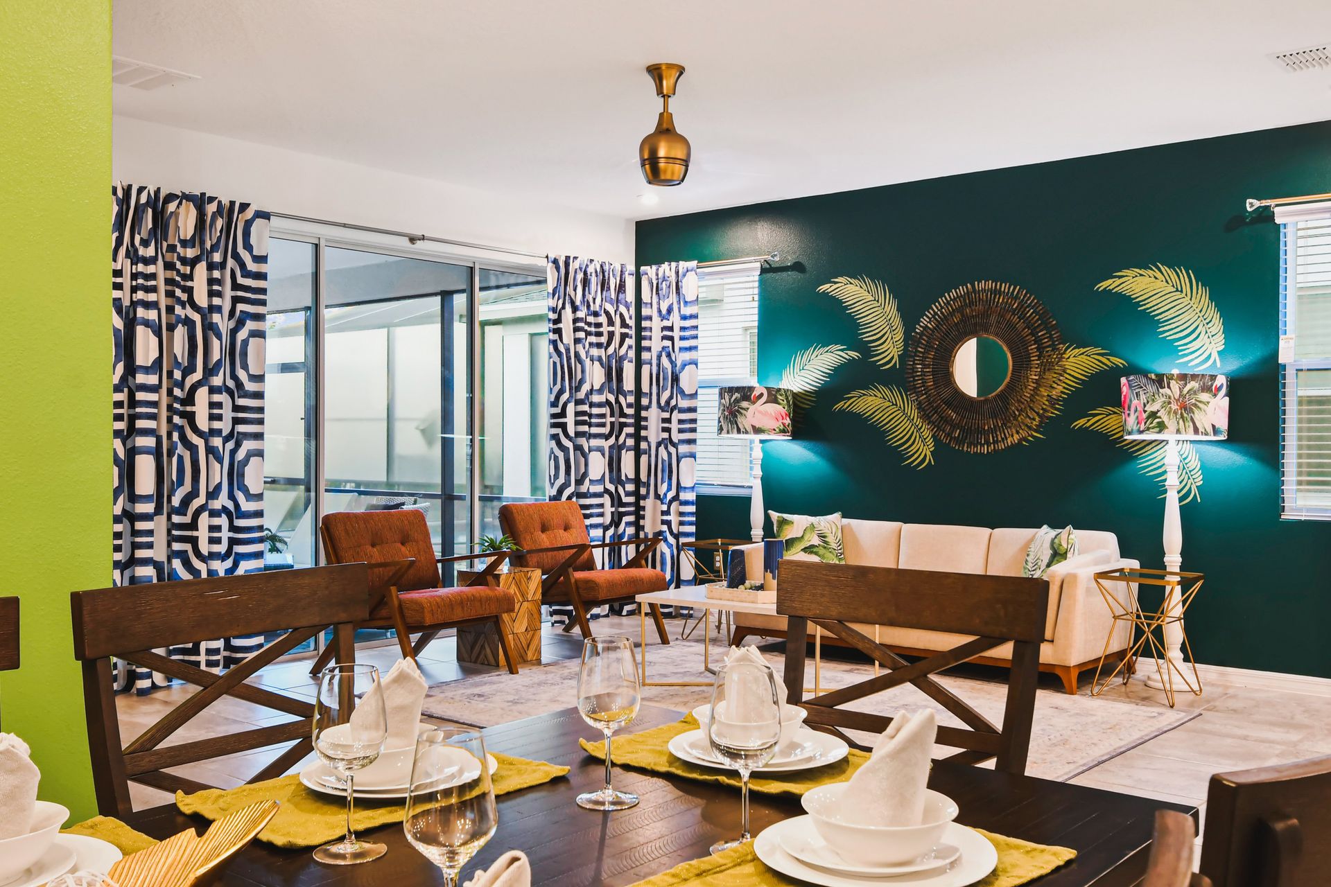 Bright dining area with tropical accents, vibrant walls, and an inviting open layout.
