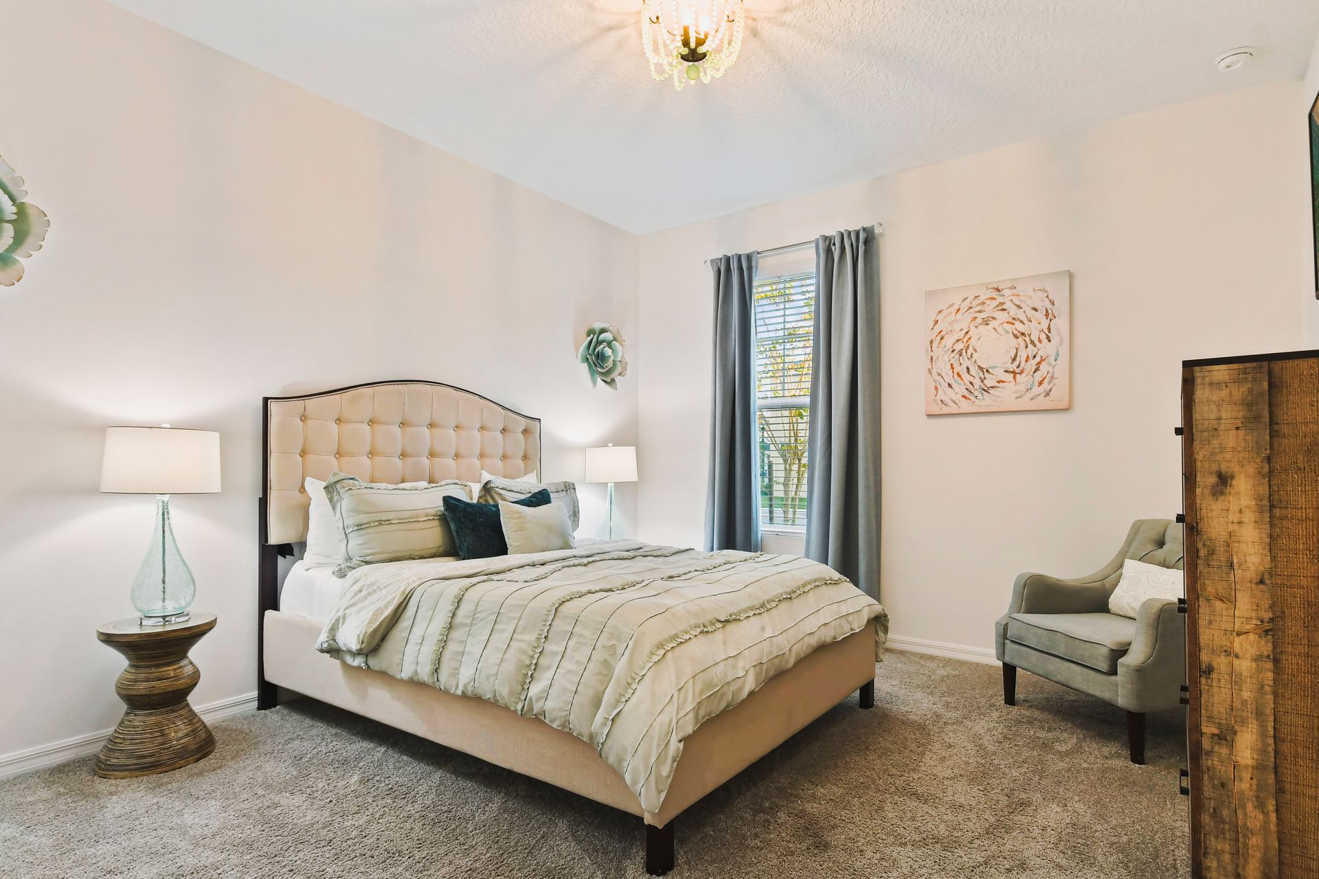 Cozy bedroom with soft tones, elegant decor, and a plush bed for restful nights.
