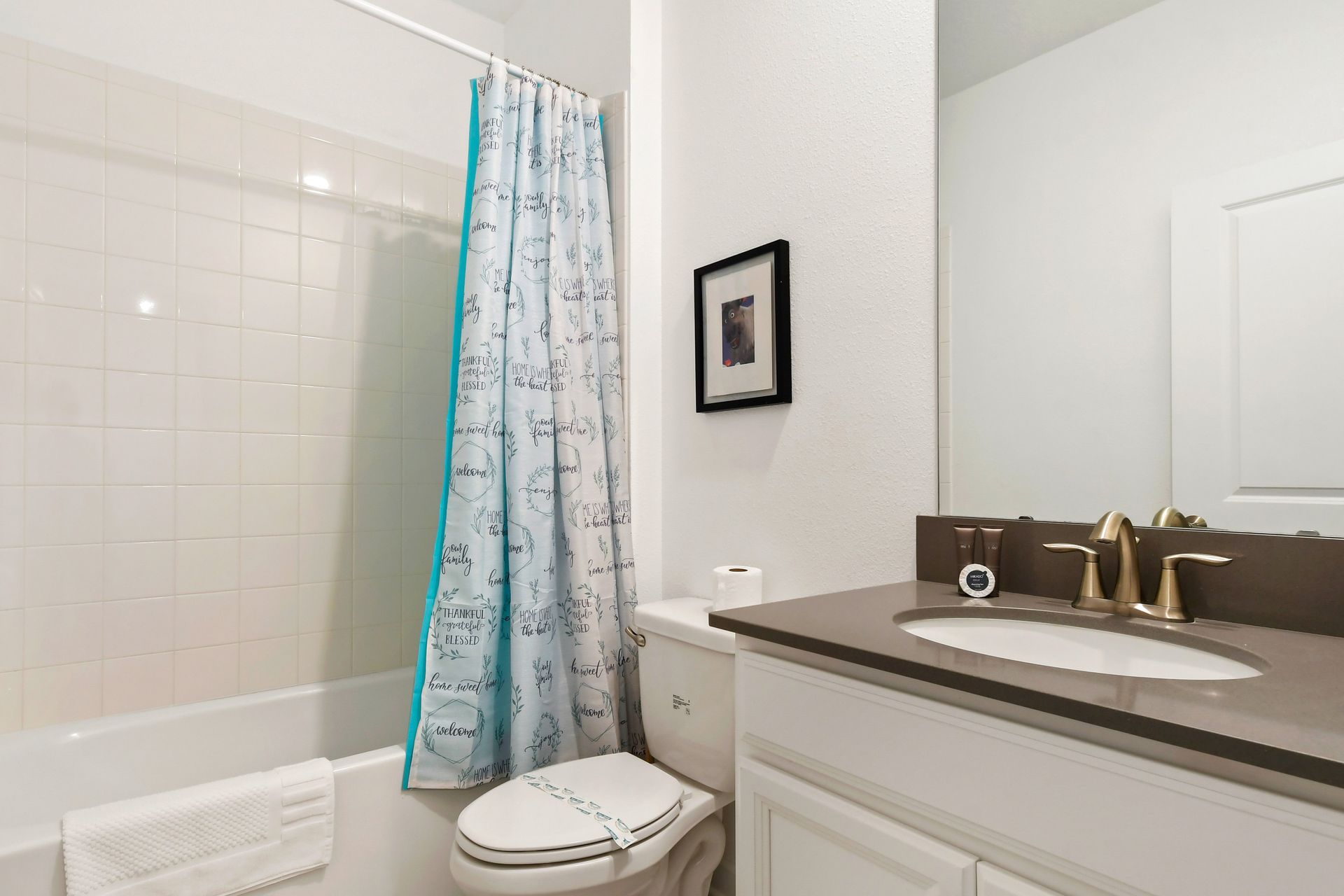 Refresh and rejuvenate in our modern bathroom, offering you a spa-like experience during your stay.