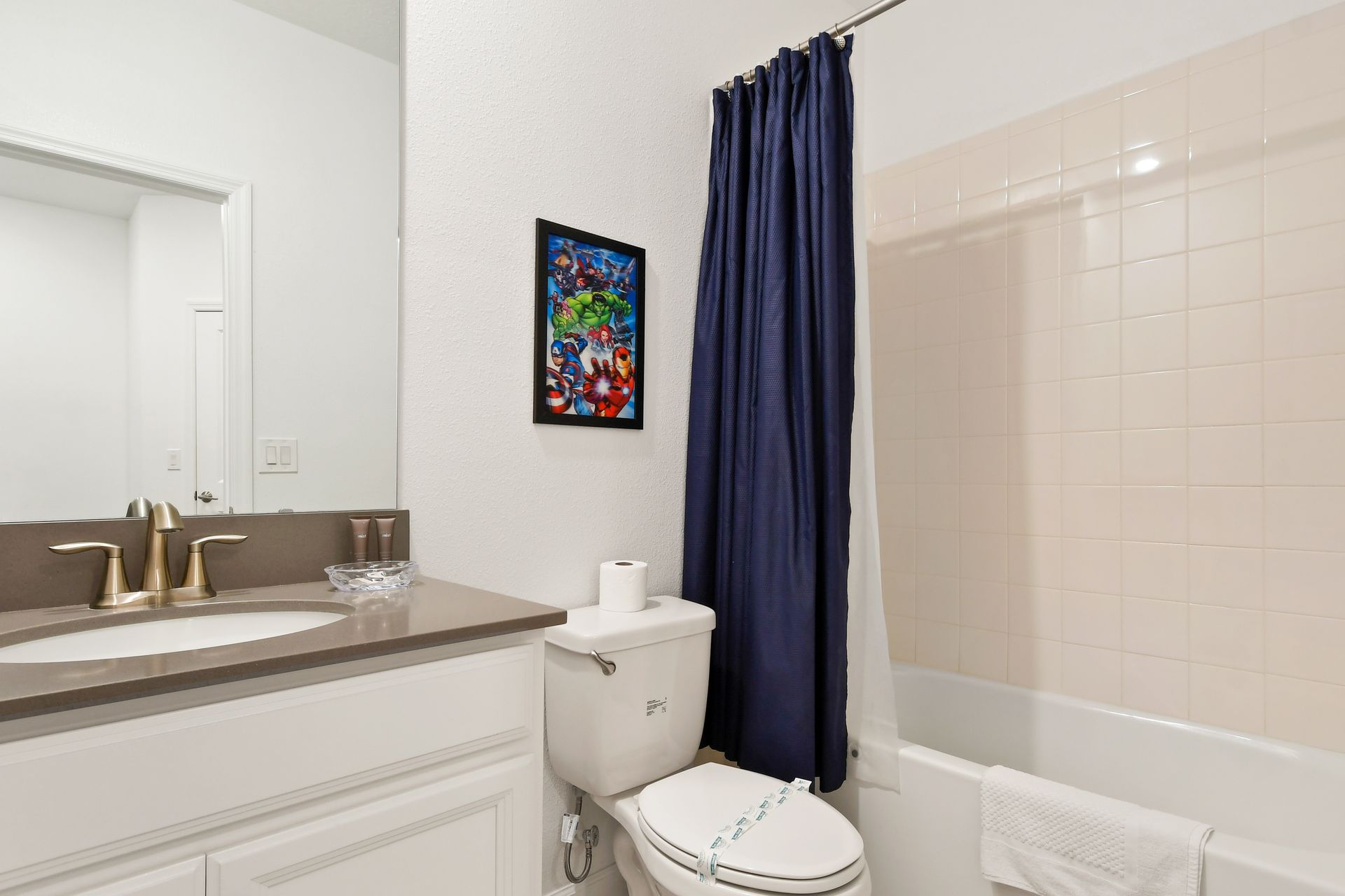 Relax and unwind in our stylish bathroom, providing you with a tranquil retreat during your time here.