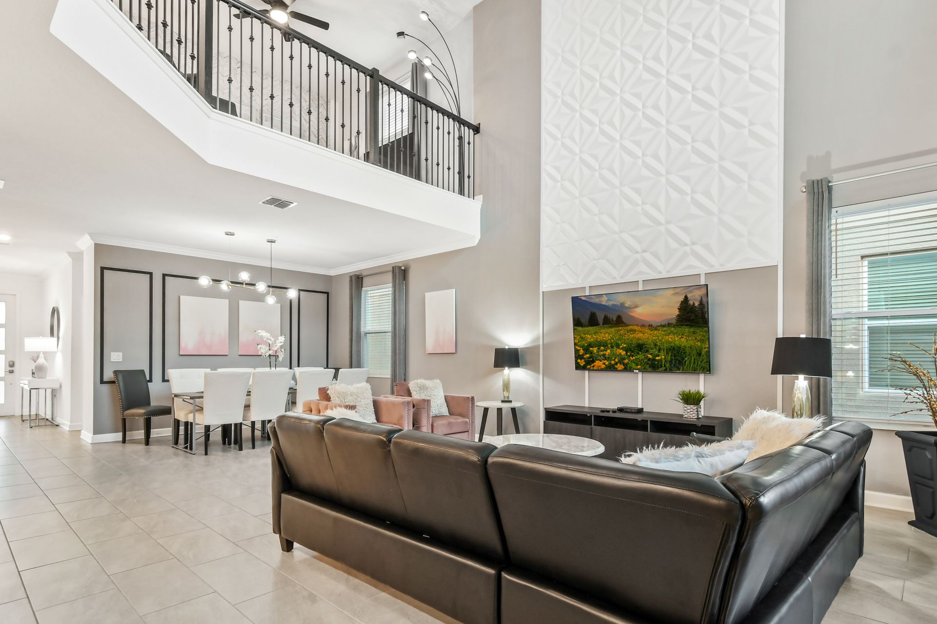 Enjoy quality time with loved ones in our inviting living room, offering a cozy space for relaxation.