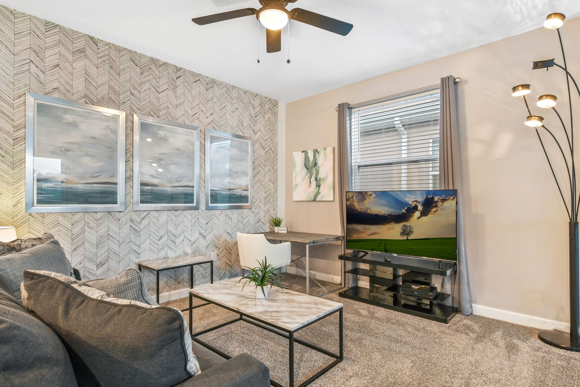 Experience comfort and convenience in our well-appointed cozy living room, designed for your relaxation.