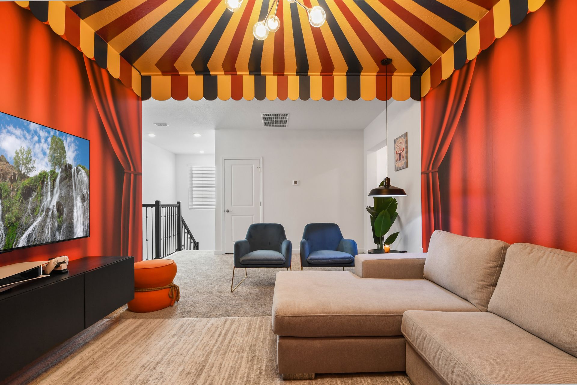Step right up to this circus-inspired media room with playful style and comfort.