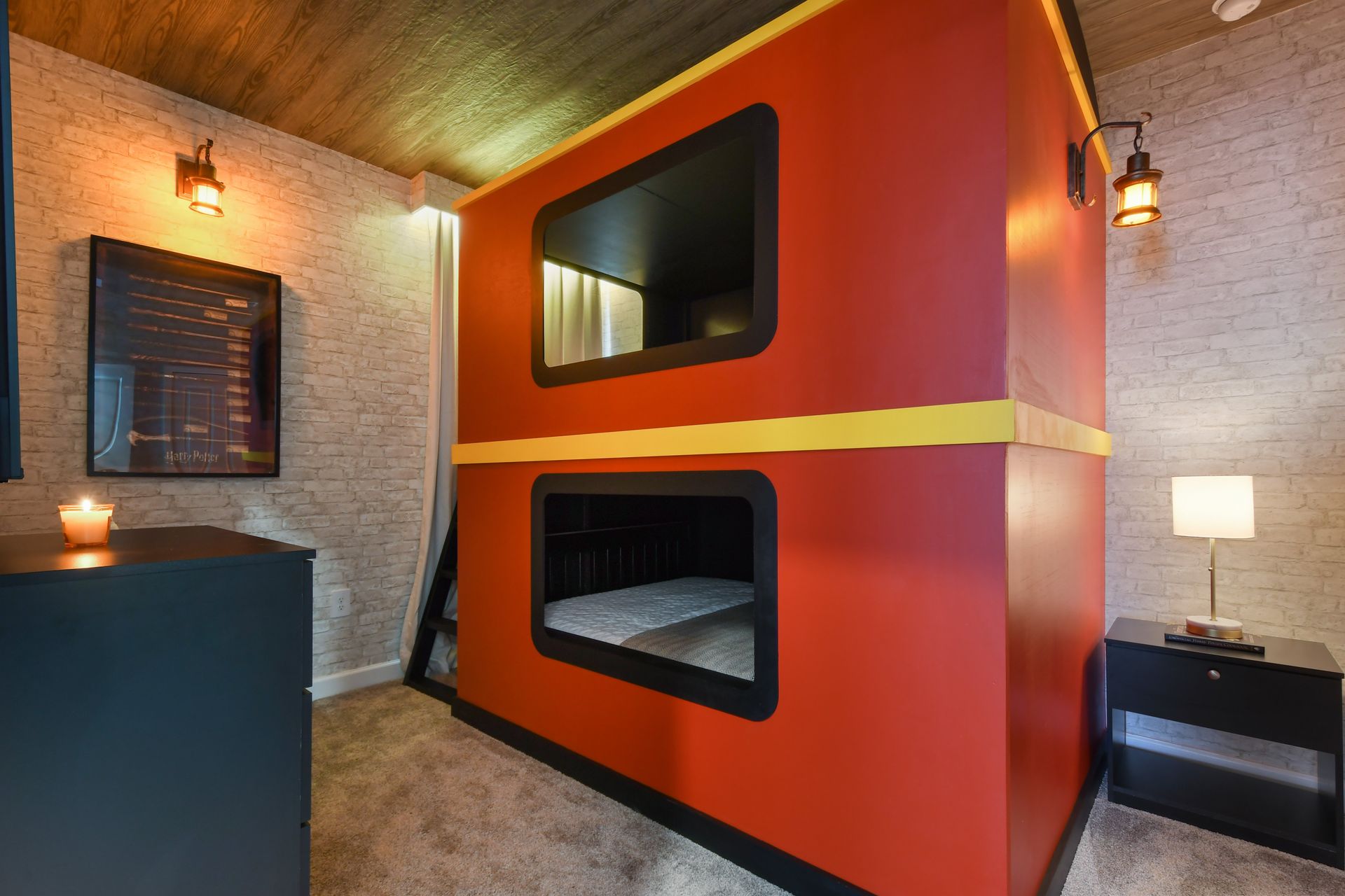 Magical train-themed bunk room with cozy sleeping pods and wizarding world charm.