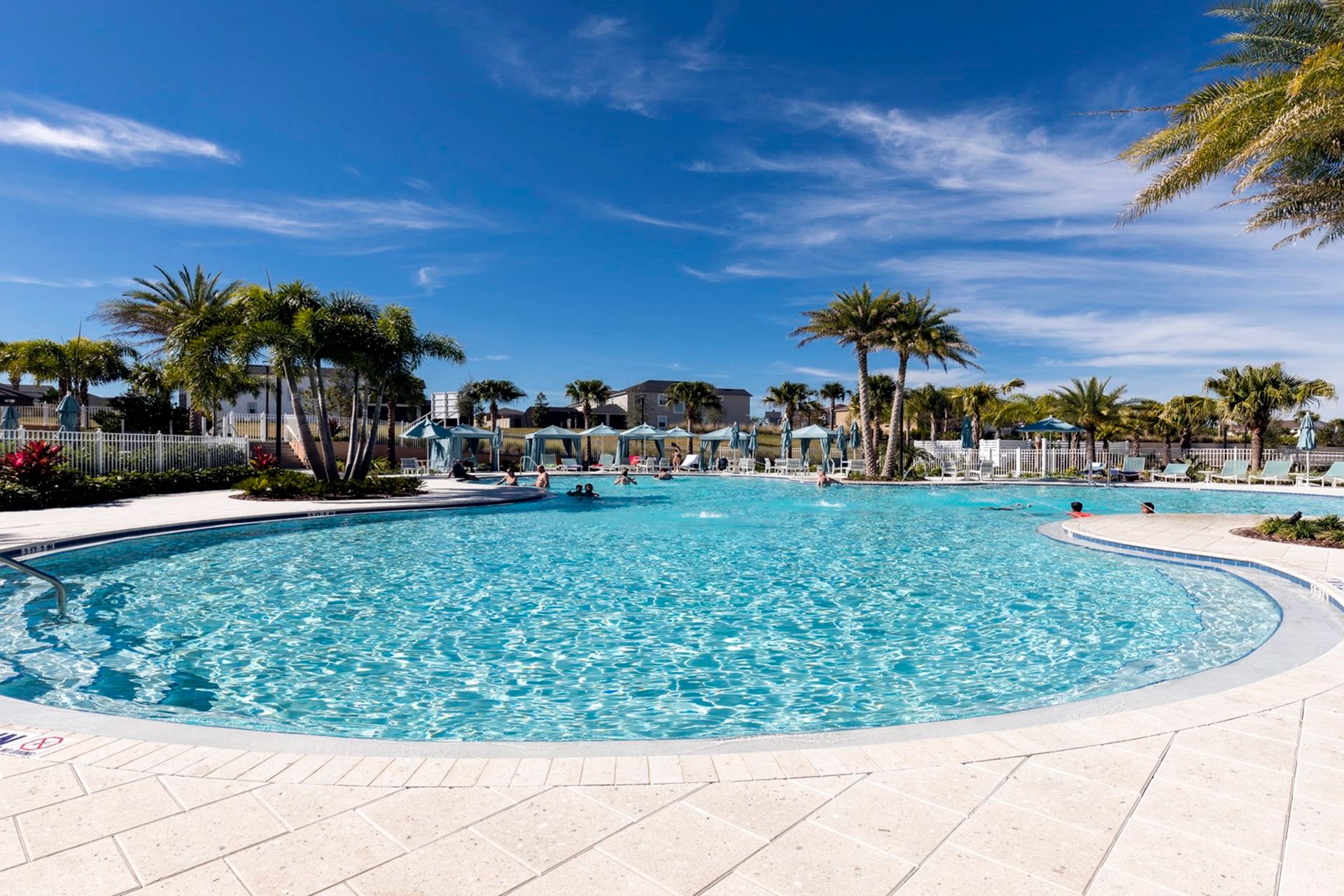 Resort-style villa with a sparkling pool, cabanas & paradise vibes!