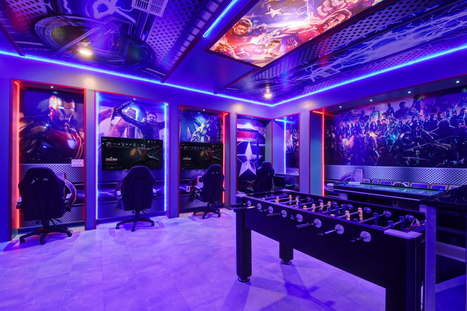 Unleash your inner hero in this epic Avengers-themed game room with foosball.