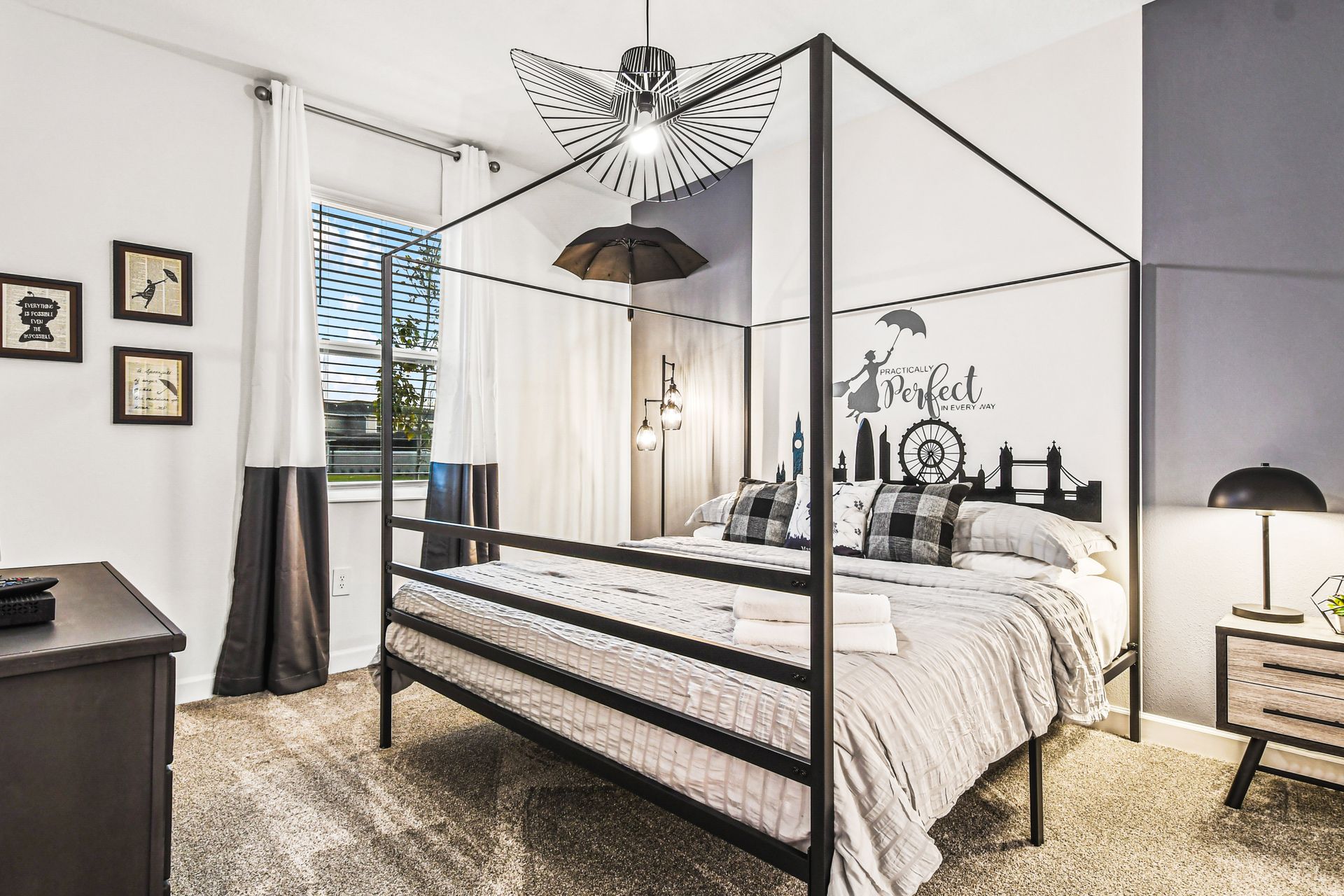 Stylish London-themed suite with a canopy bed and magical modern touches.
