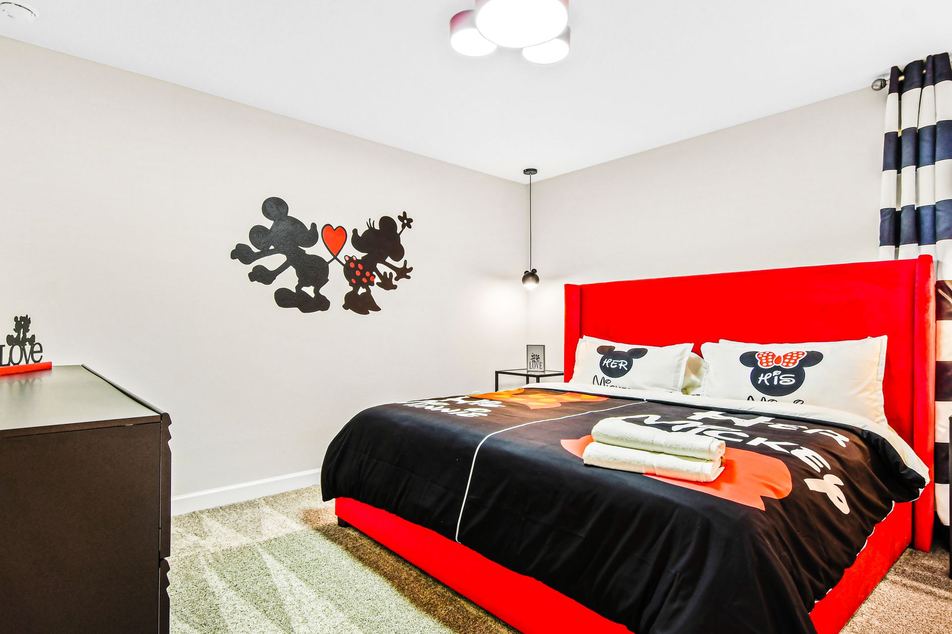 Romantic Mickey and Minnie suite with bold colors and playful Disney charm.