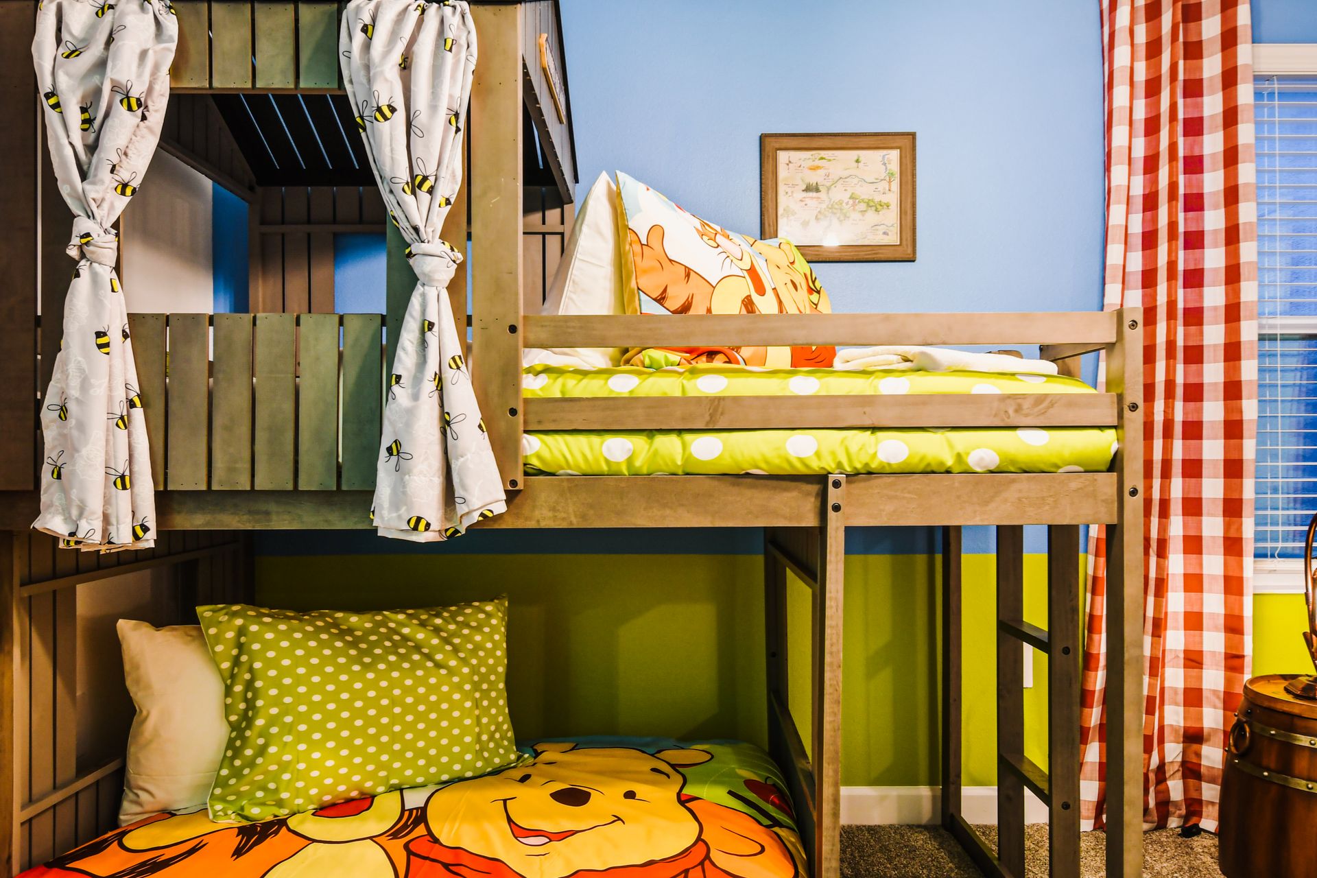 Whimsical bunk room with Winnie the Pooh charm and cozy, kid-friendly vibes.