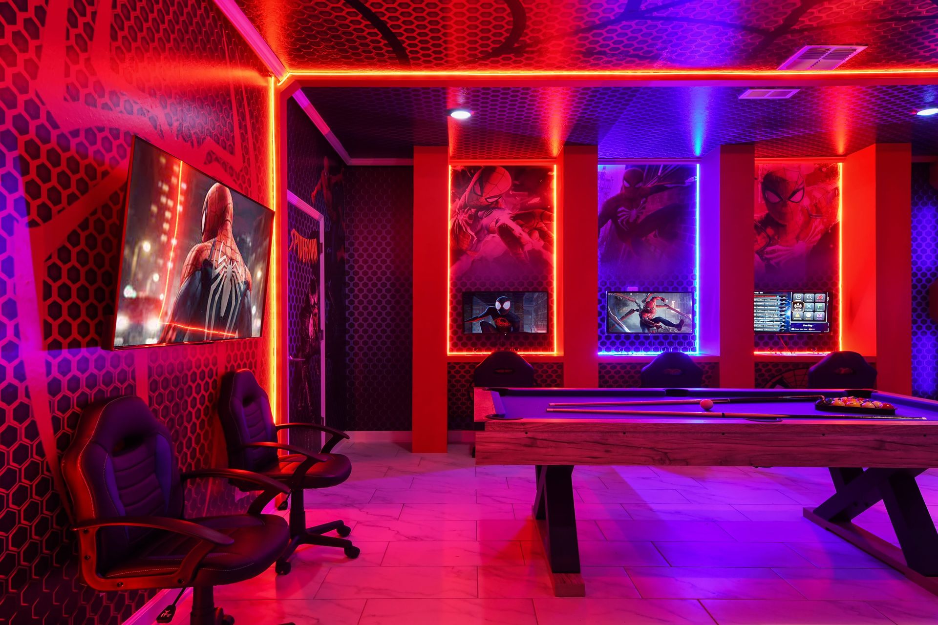 Epic Spider-Man game room with pool table, dual gaming setups, and neon vibes.