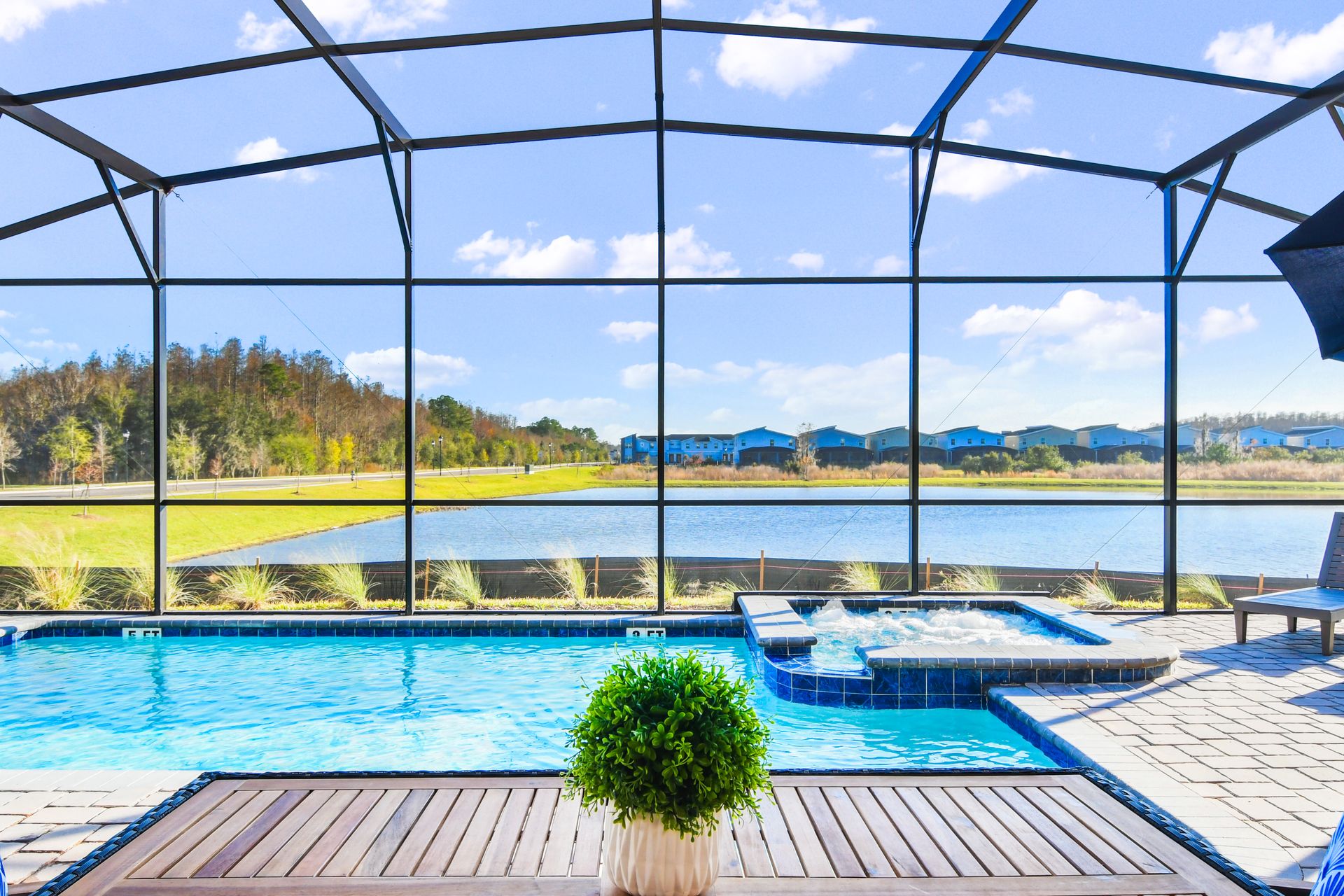 Soak up serene water views from your private pool, spa, and sunny screened lanai.