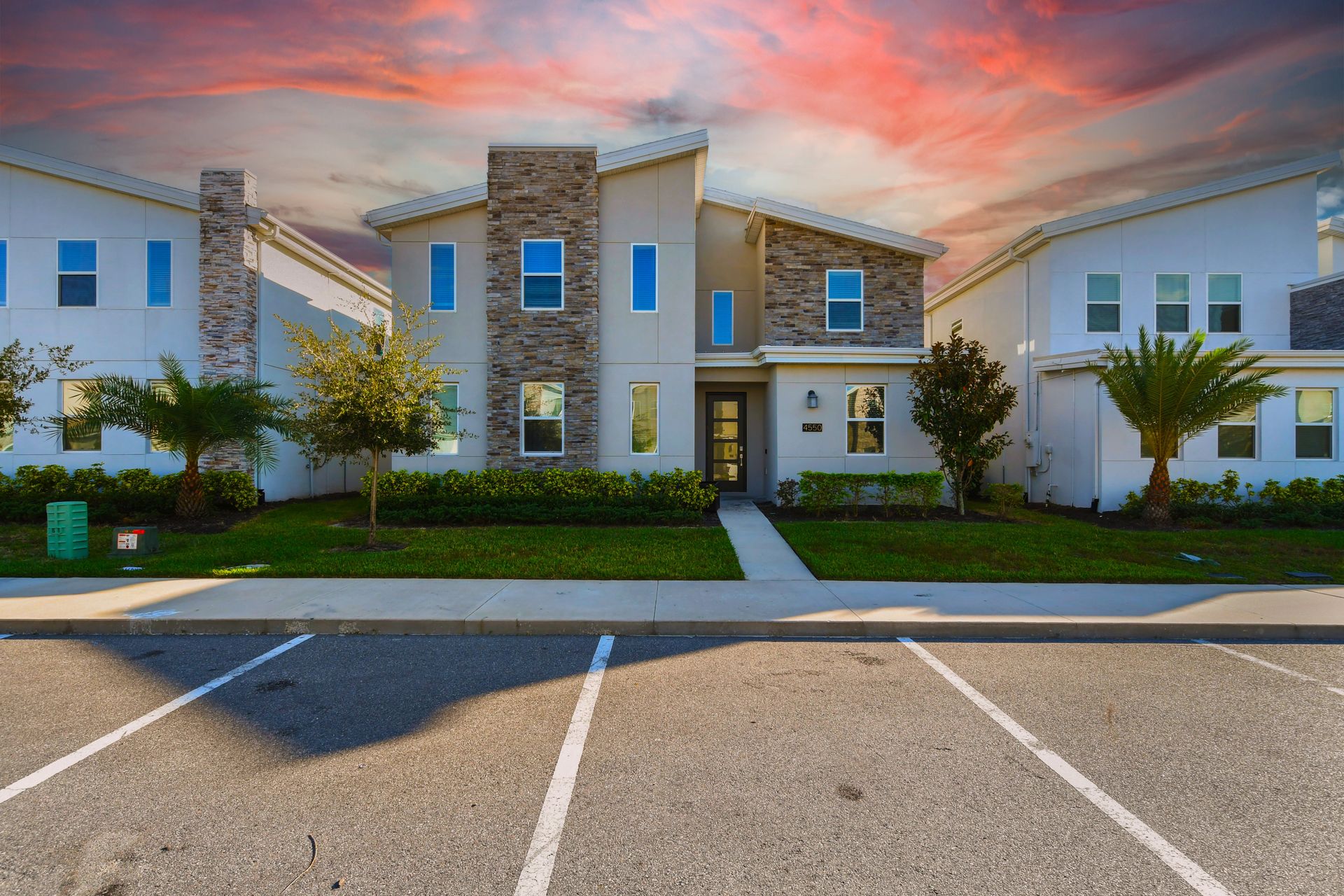 Unwind on a sun-drenched private terrace with scenic views and plush seating.