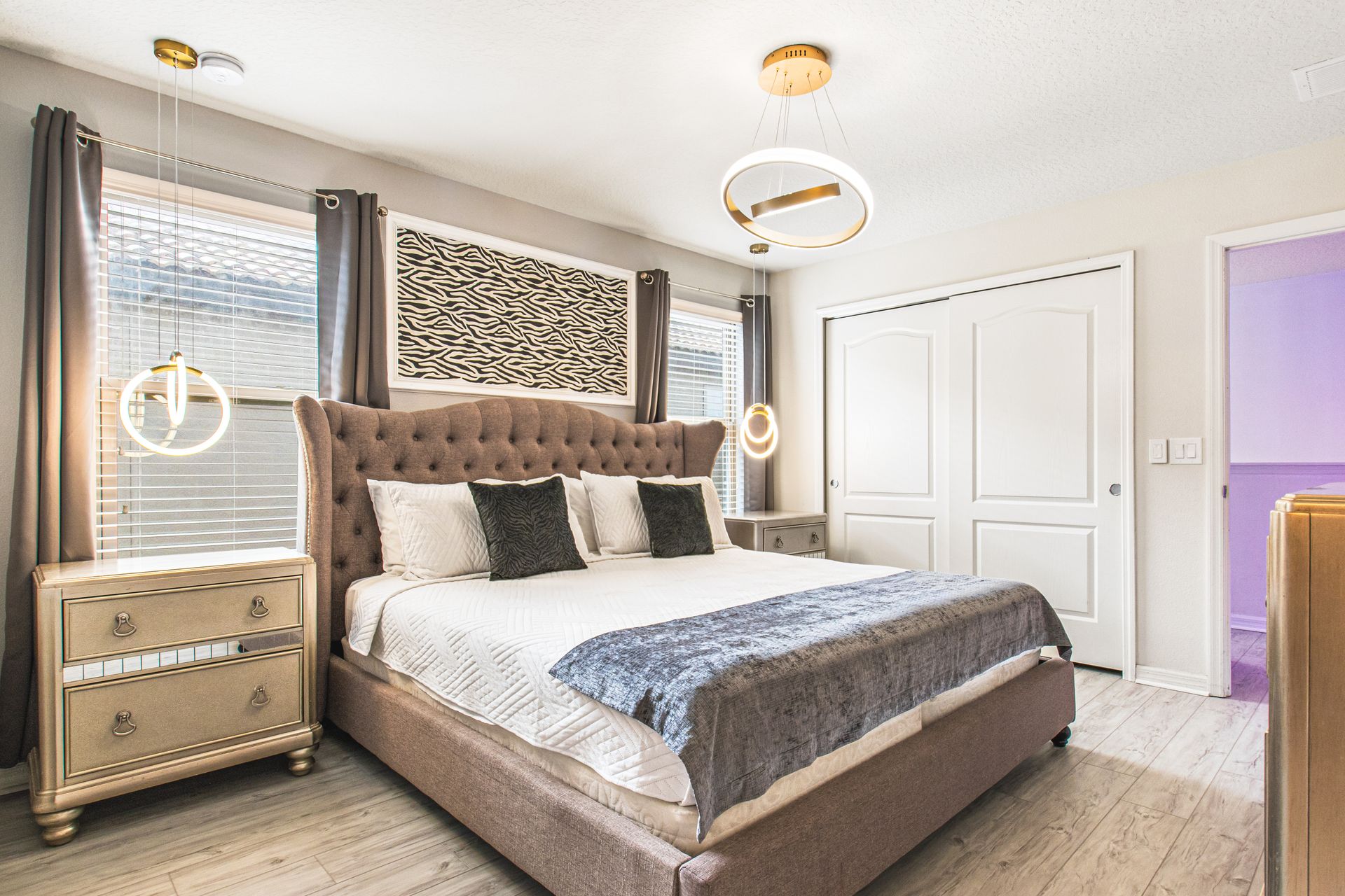 Regal comfort with a king-sized bed and a TV, offering a luxurious and entertainment-ready retreat.