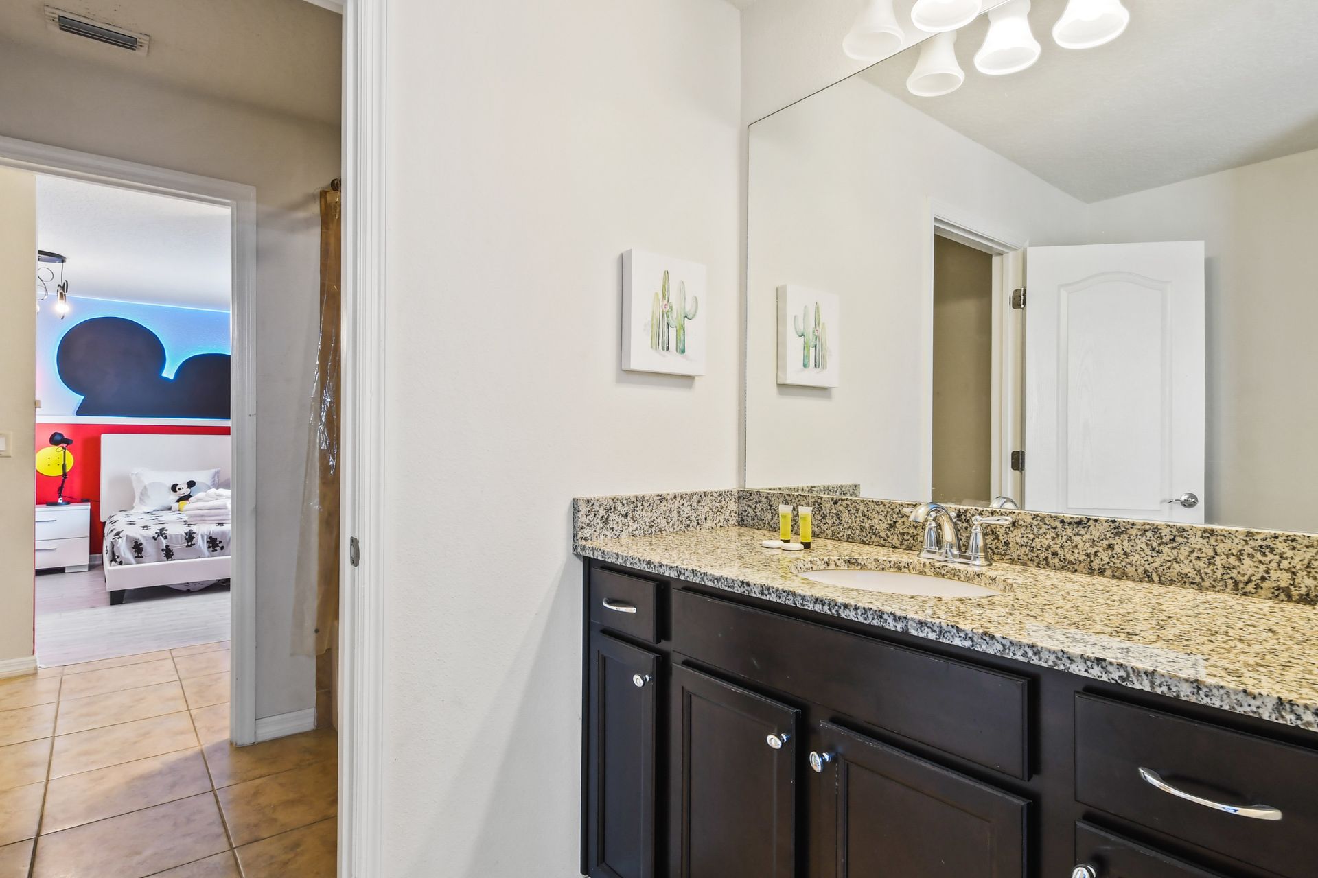 Private Mickey Mouse Bathroom: Exclusive and themed for the Mickey Mouse bedroom, ensuring a whimsical and delightful personal space