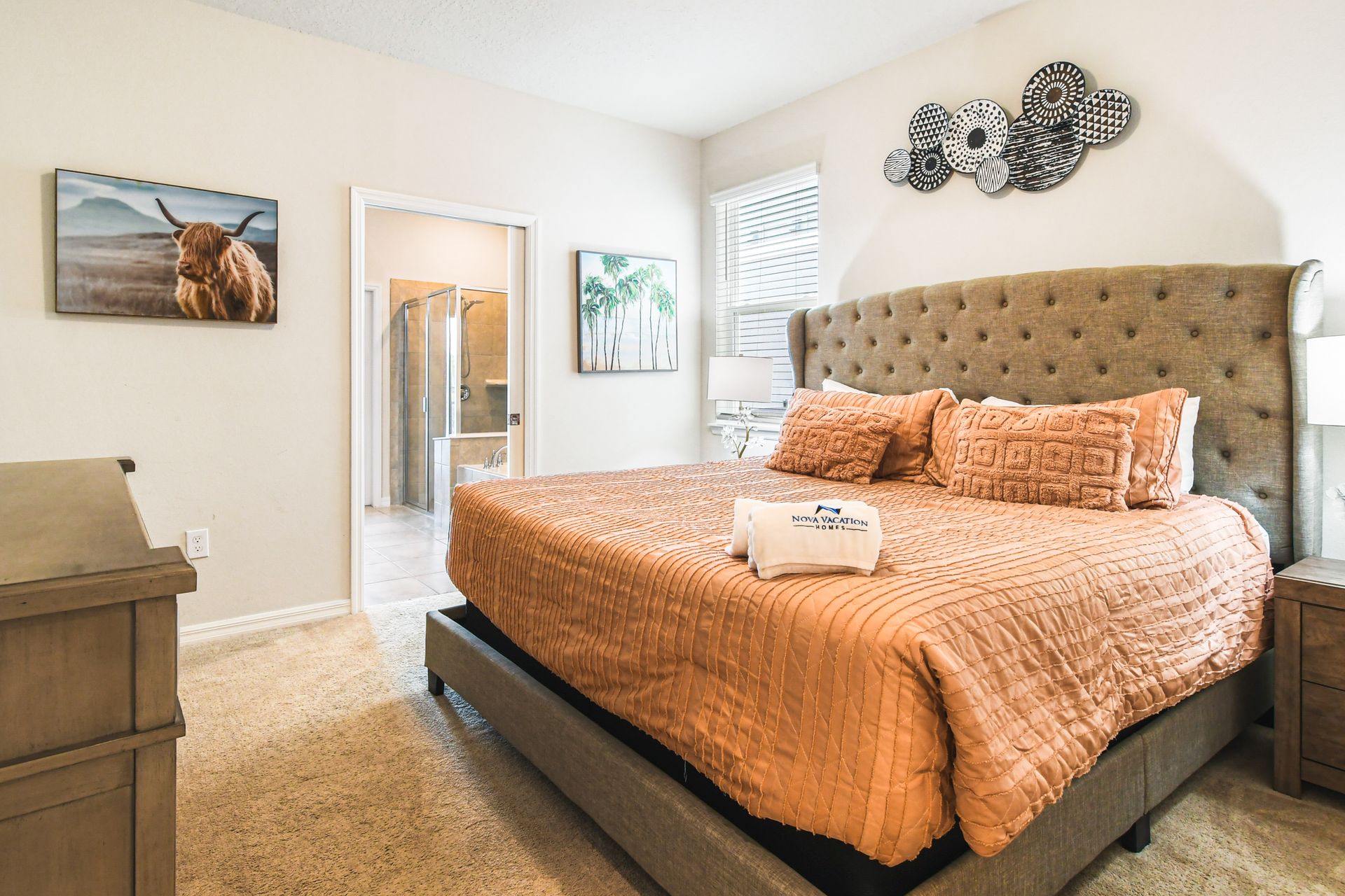 Vibrant living room with modern decor and a stunning nature view, inviting relaxation and enjoyment!