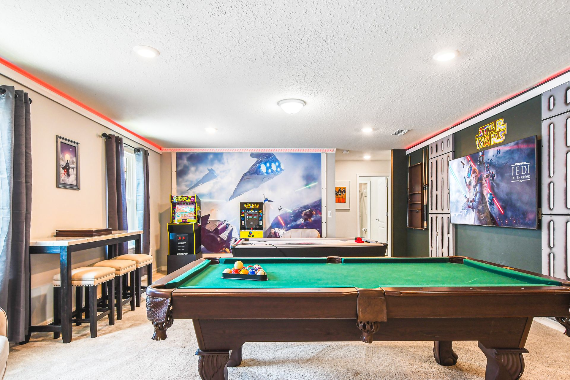 Enjoy the game time with your family and friends in our gaming room. It features a full-size pool table and air hocky.