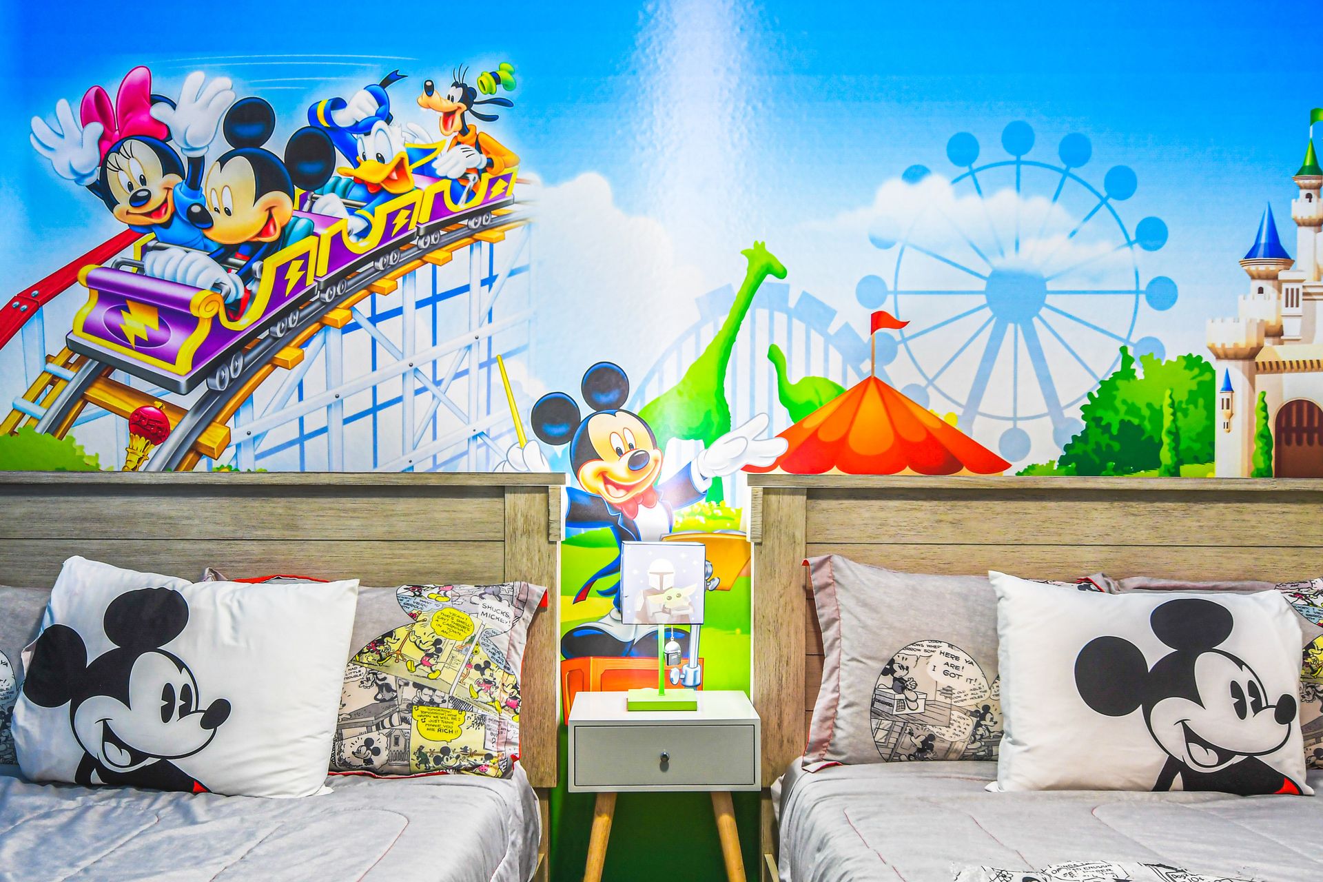 Colorful Disney-themed room, bursting with magic and adventure for joyful childhood dreams!