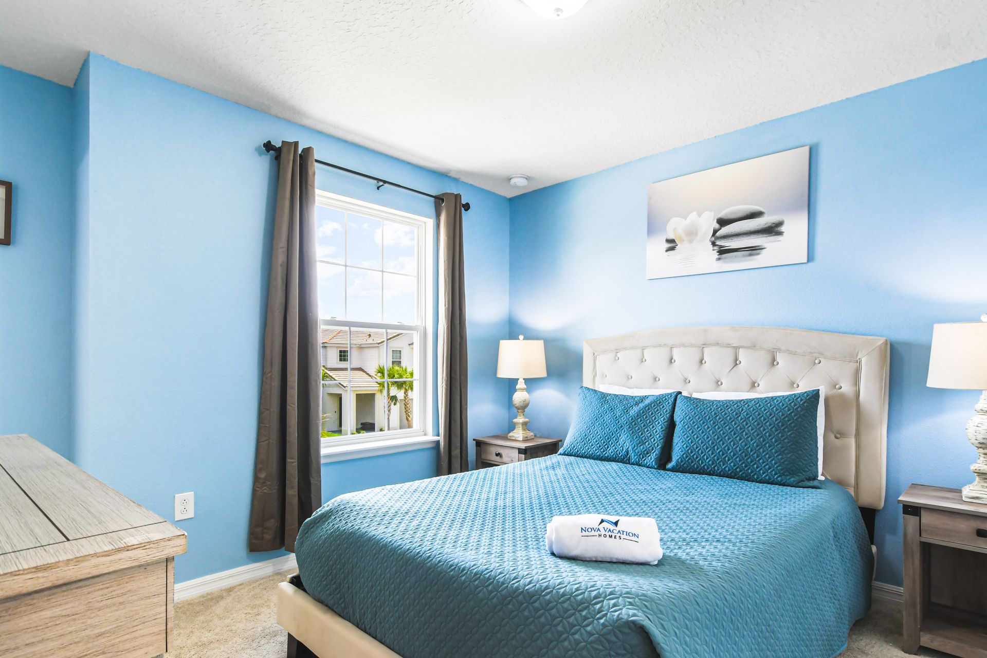 Serene blue bedroom, perfectly styled for peaceful slumber and stylish living.