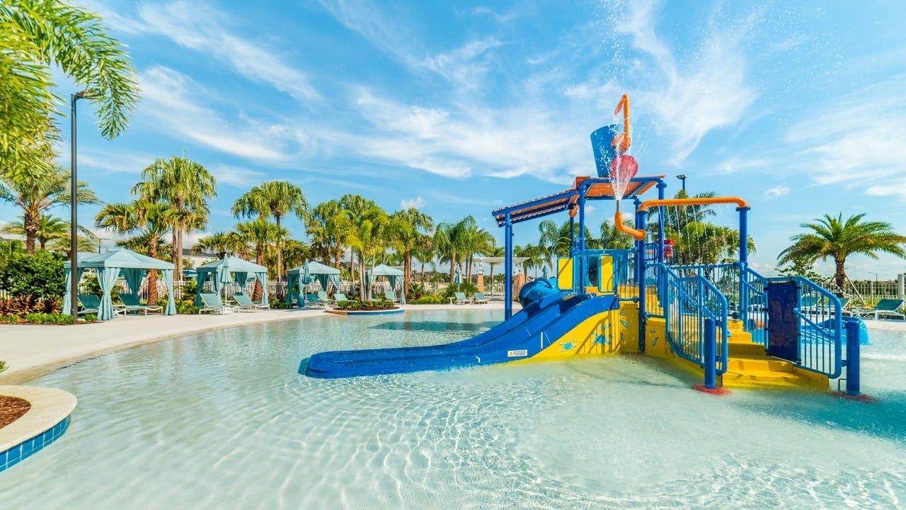Kids' paradise! Resort's colorful water park with slides & games—splash into fun and adventure!