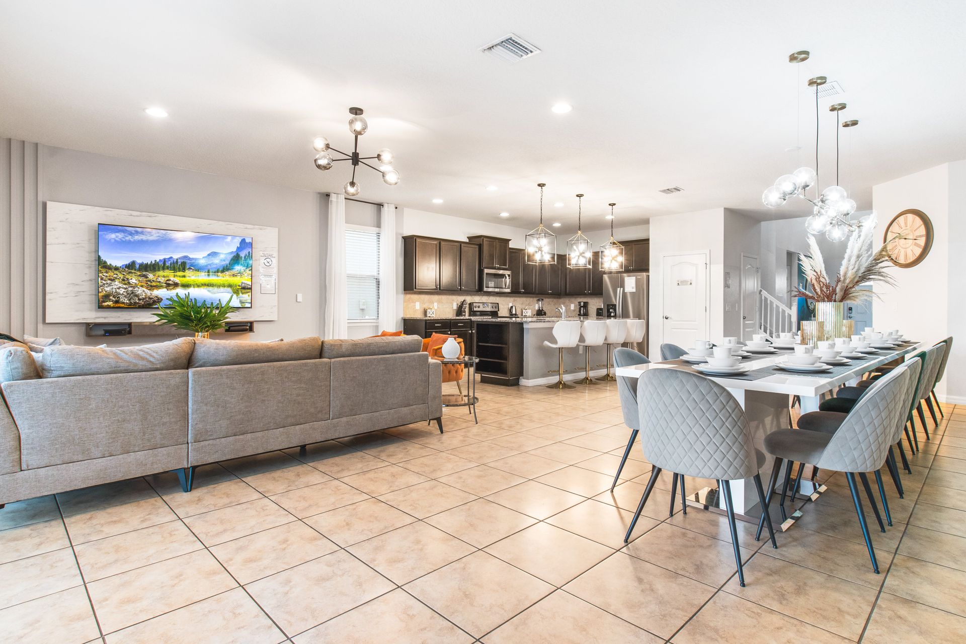 Stylish open-concept living, dining, and kitchen area—perfect for gatherings!